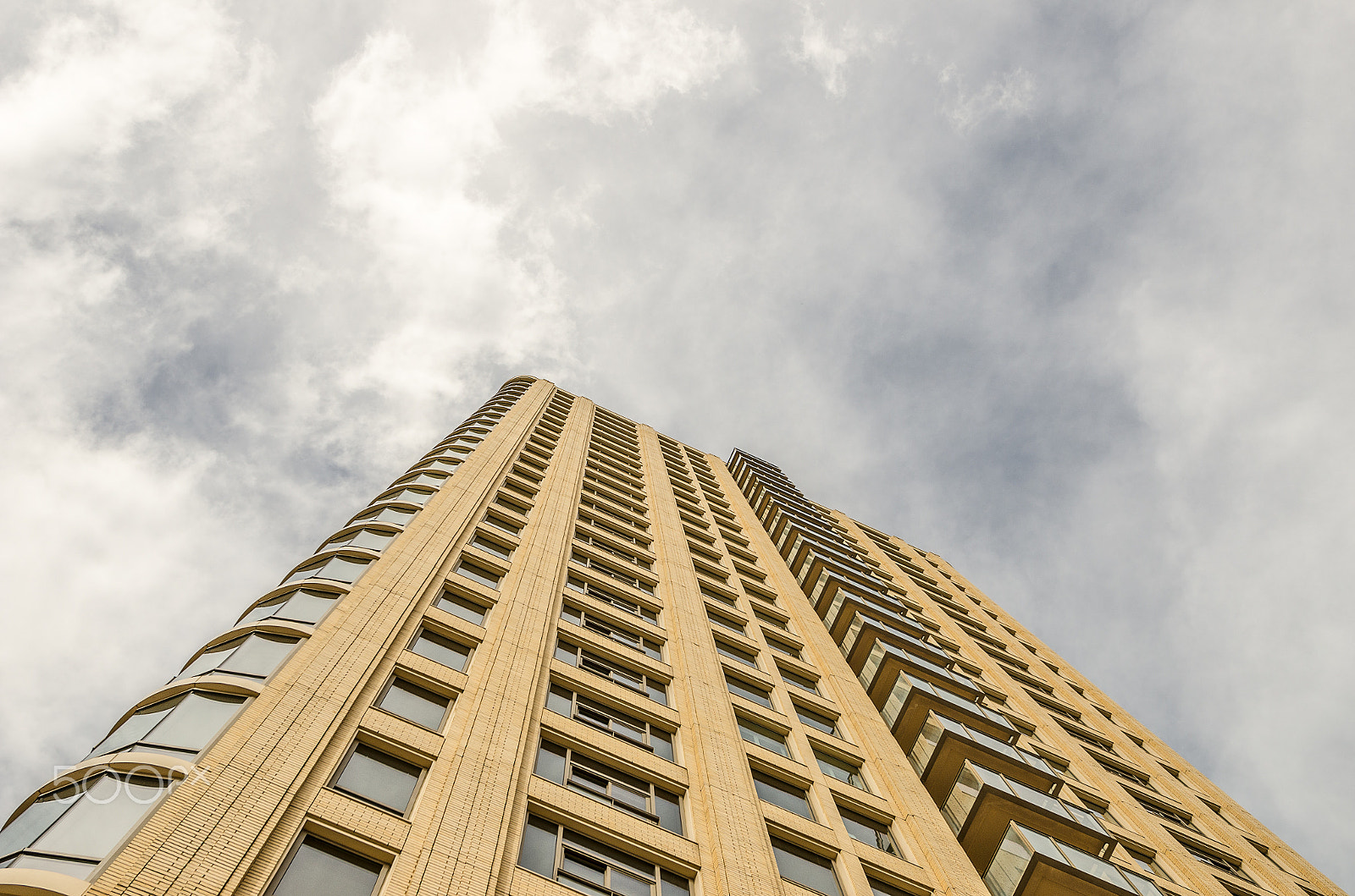 Nikon AF-S Nikkor 14-24mm F2.8G ED sample photo. Skyscraper in the clouds photography