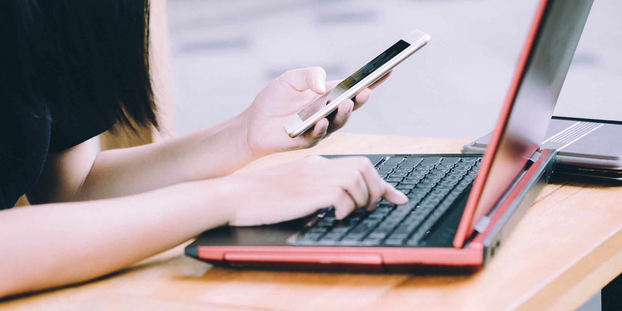 Fujifilm X-A2 sample photo. Young hipster woman using smartphone and laptop, online concept photography