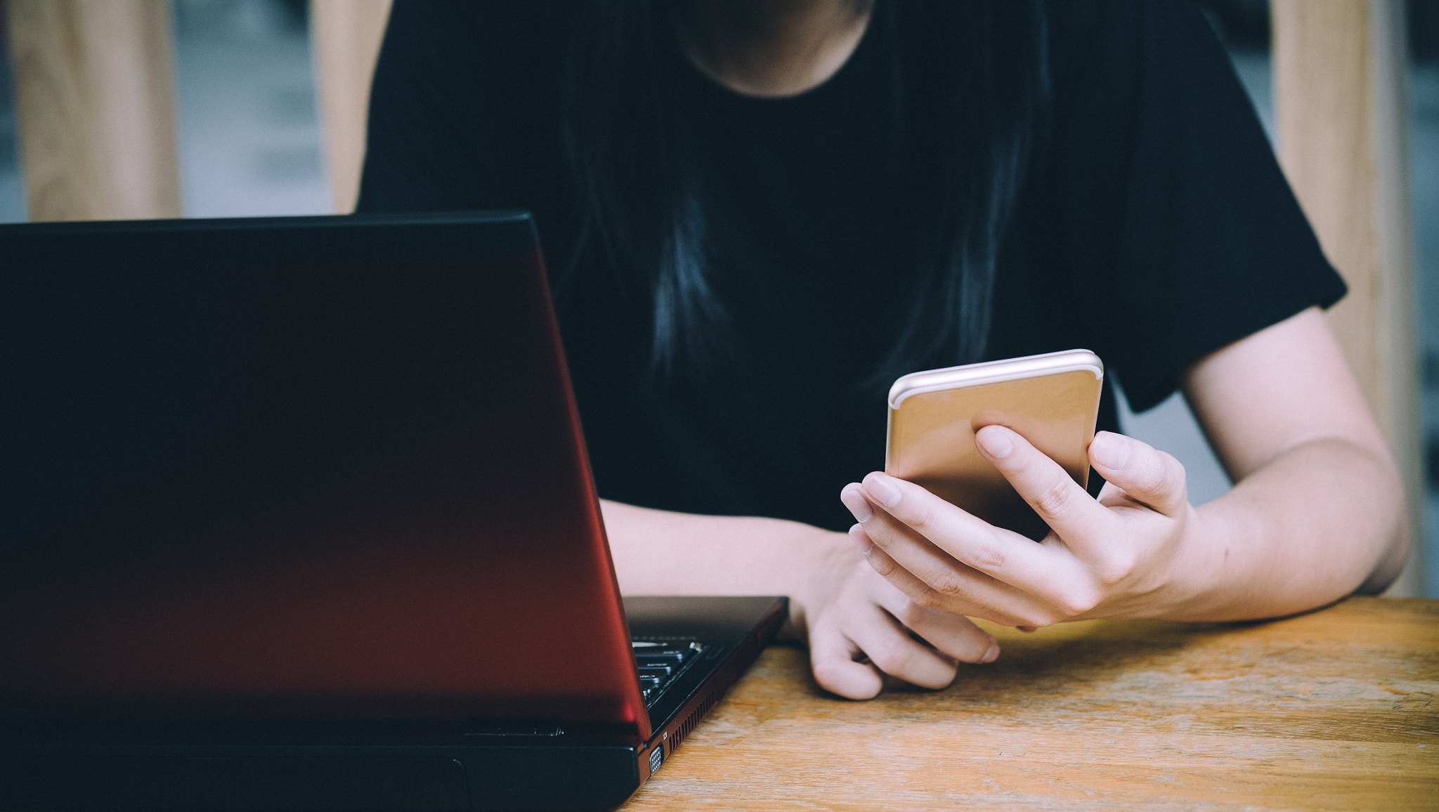 Fujifilm X-A2 sample photo. Young hipster woman using smartphone and laptop, online concept photography