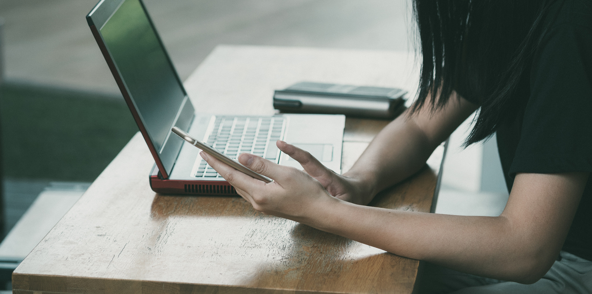 Fujifilm X-A2 sample photo. Young hipster woman using smartphone and laptop, online concept photography