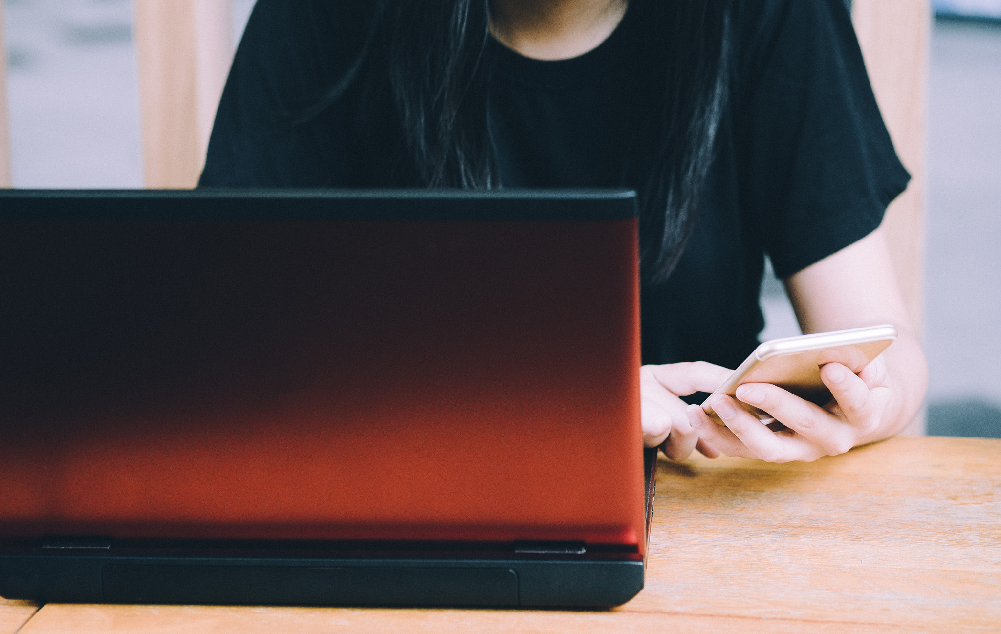 Fujifilm X-A2 sample photo. Young hipster woman using smartphone and laptop, online concept photography