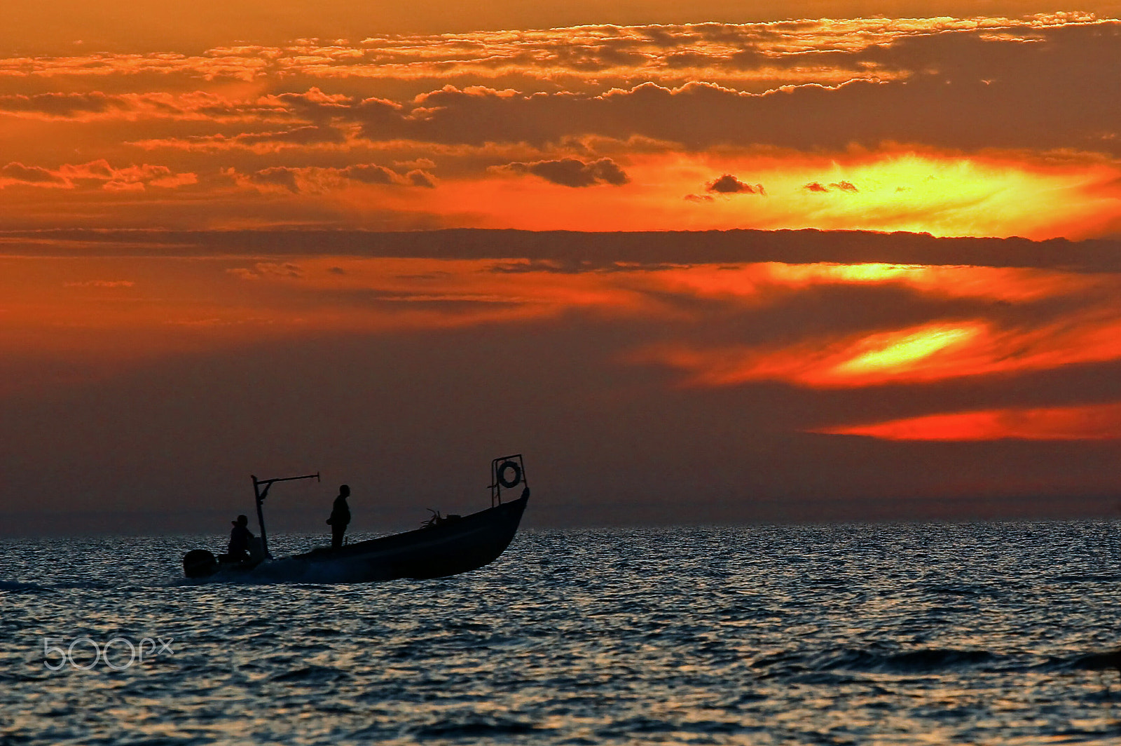 Canon EOS 600D (Rebel EOS T3i / EOS Kiss X5) + Canon EF 70-200mm F4L USM sample photo. Fisherman's boat - sunset at tel-aviv beach - israel photography