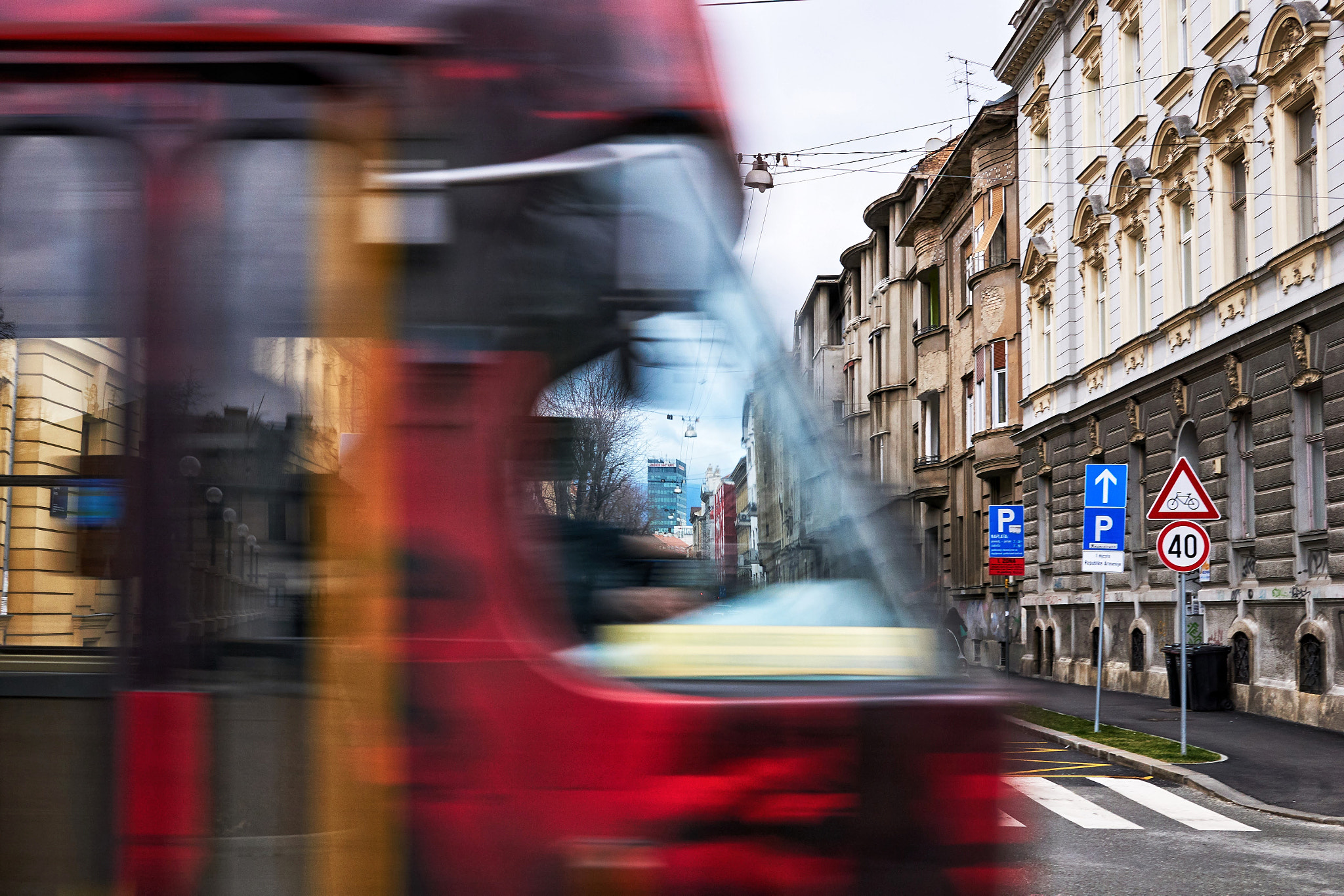 Sony a6000 + Sigma 30mm F2.8 EX DN sample photo. Passing tram  photography