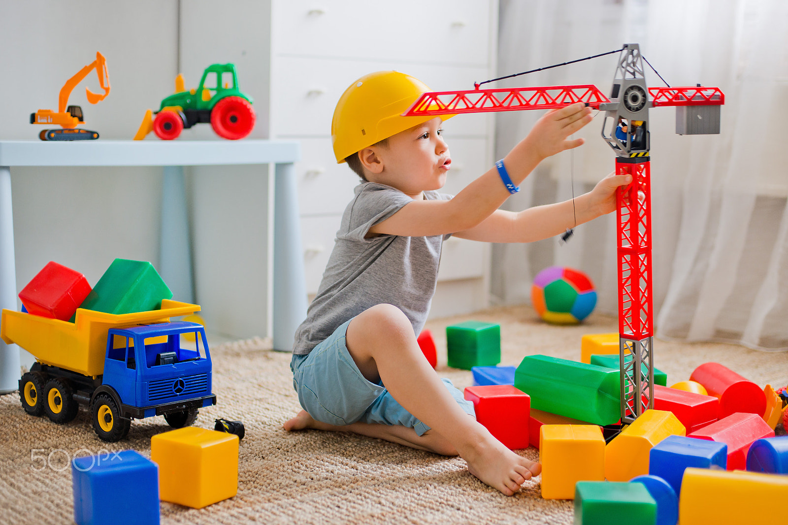 Nikon D800 sample photo. Child plays in the builder in the room photography