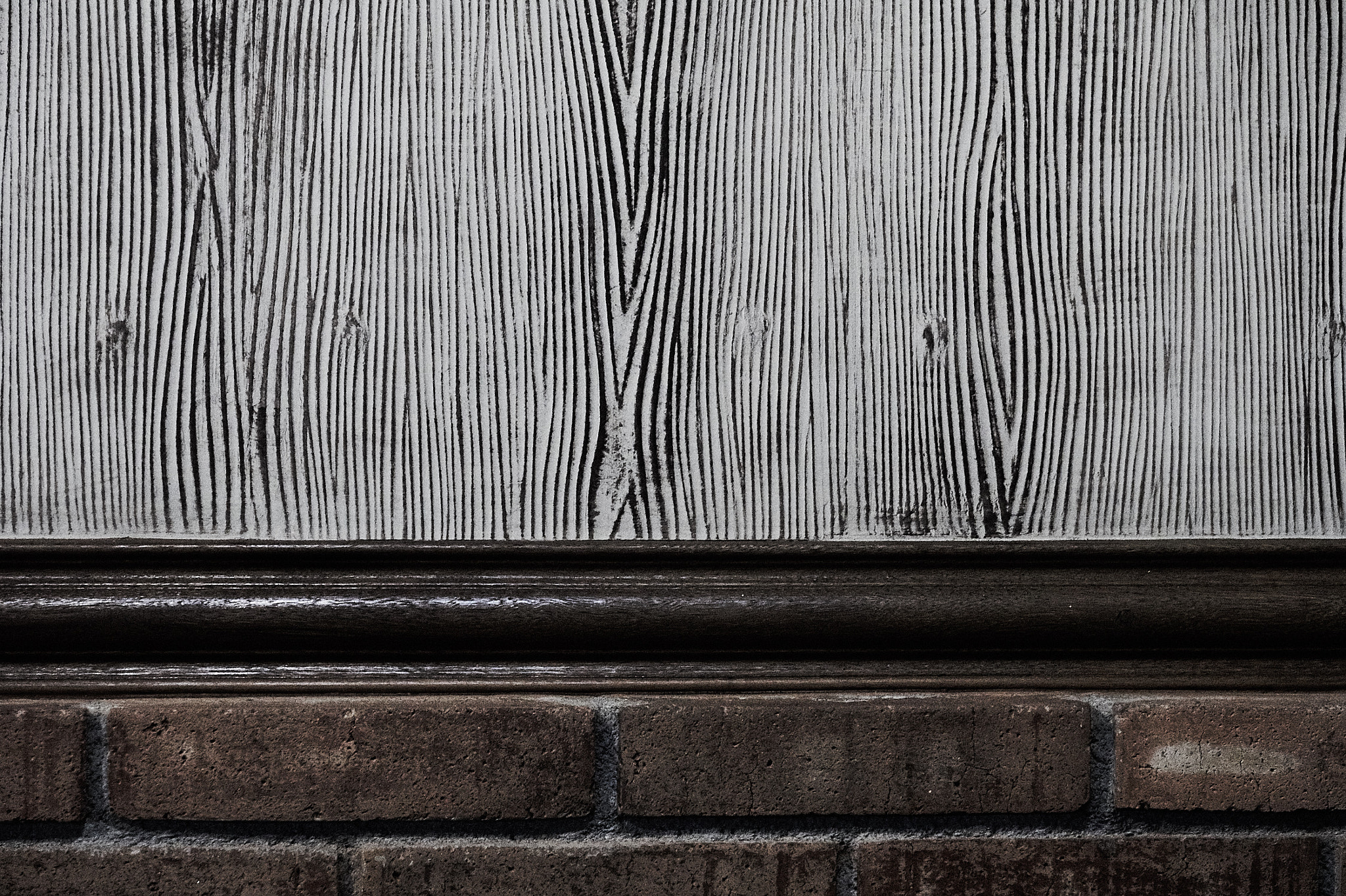 Sony E 55-210mm F4.5-6.3 OSS sample photo. Black and white pattern on the wall photography