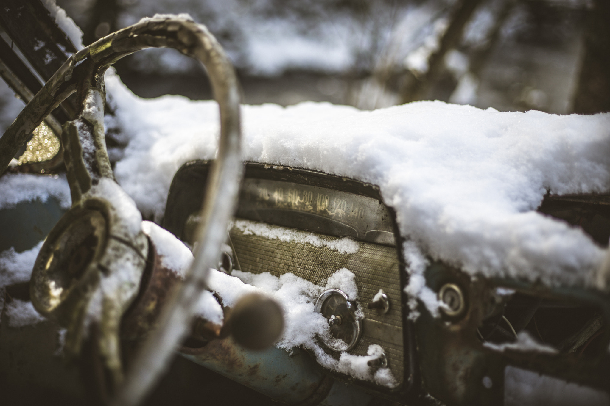 Sony a7 II + Canon EF 50mm F1.8 STM sample photo. Abandoned car covered with snow photography