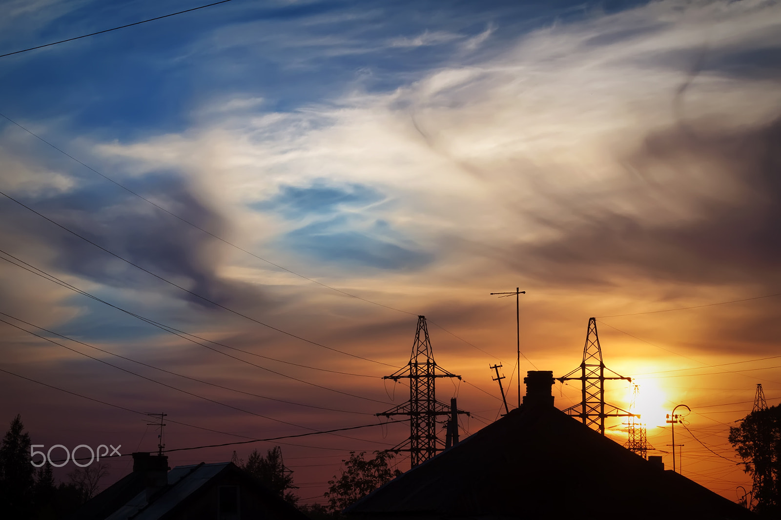 Canon EF 70-300mm F4-5.6 IS USM sample photo. Sunset... village... power lines photography