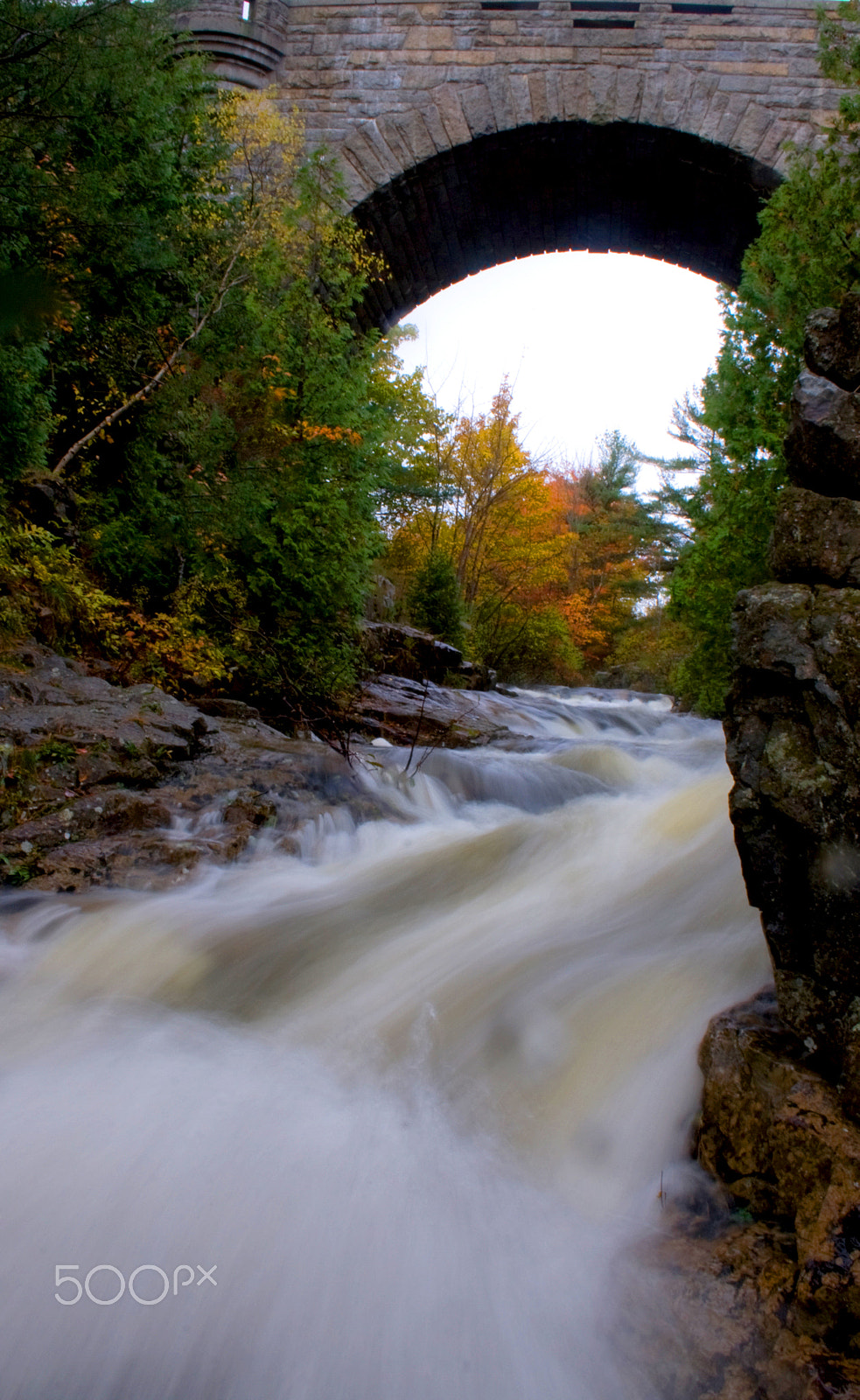 Canon EOS 400D (EOS Digital Rebel XTi / EOS Kiss Digital X) sample photo. River flowing under historic arched stone bridge acadia national photography