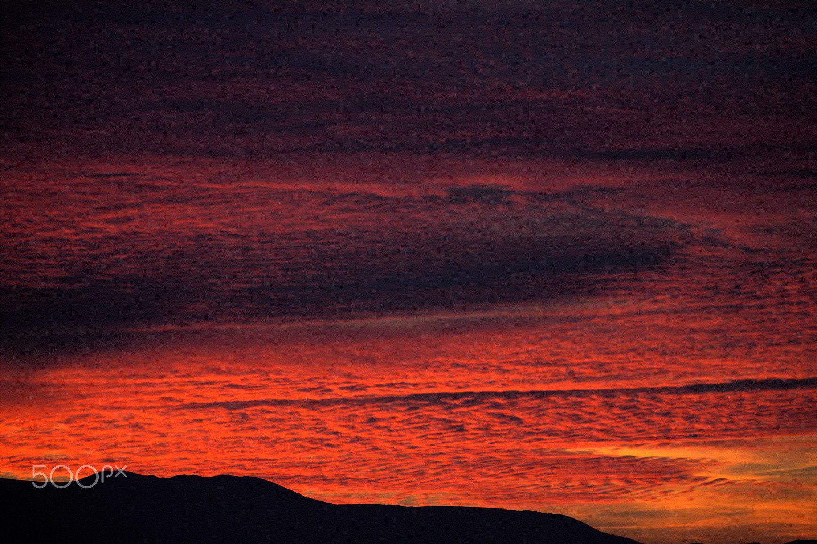 Canon EF-S 55-250mm F4-5.6 IS sample photo. Clouds on sunset photography