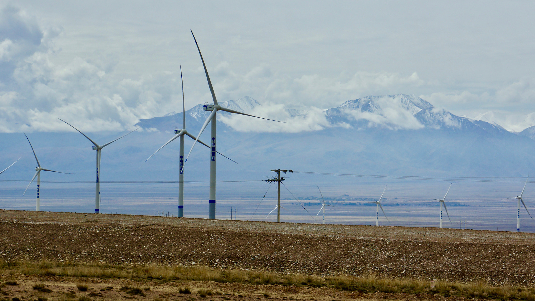Sony E 55-210mm F4.5-6.3 OSS sample photo. Windmills in qinhai, china photography