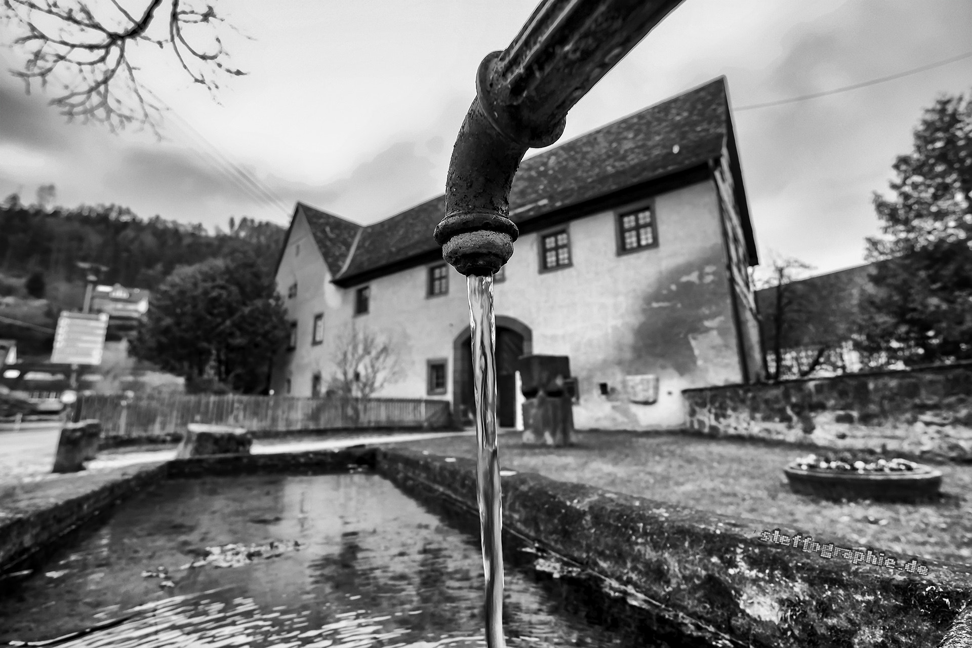 Fujifilm X-T2 sample photo. Water tap in black photography