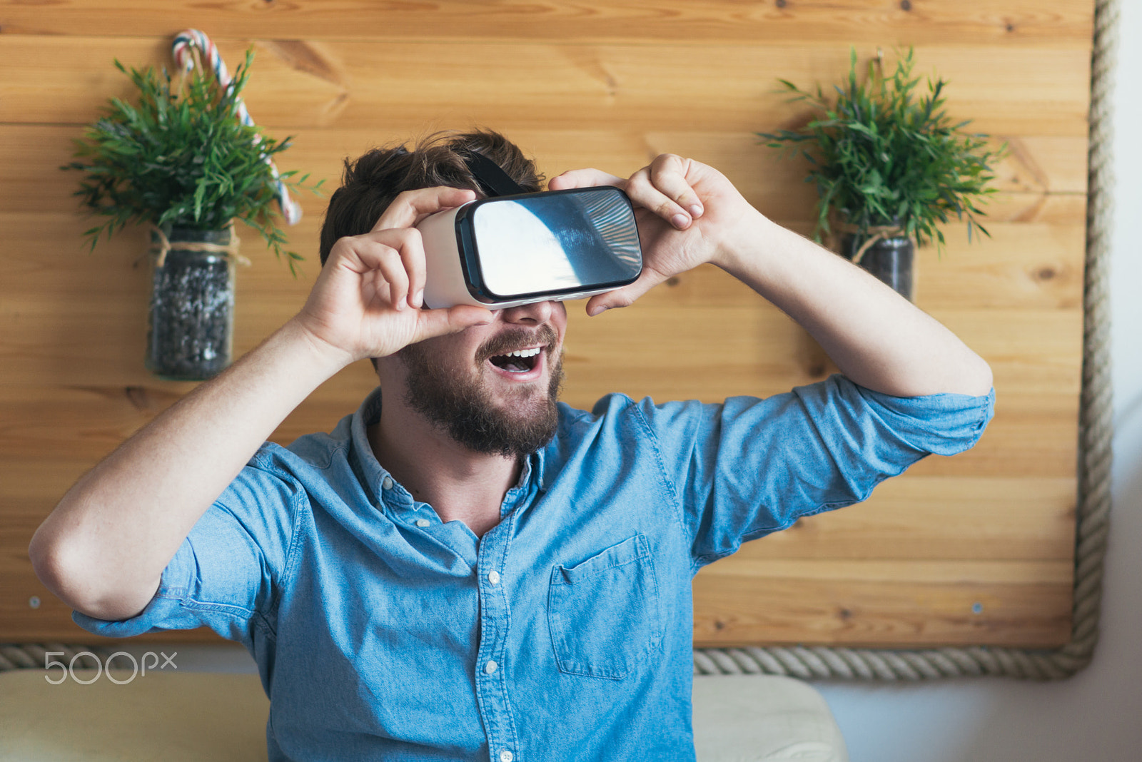 Nikon D800 sample photo. Young smiling man using vr headset. photography