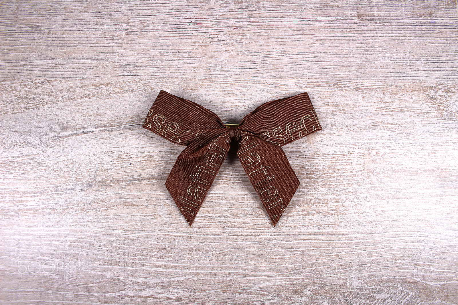 Canon EF-S 18-55mm F3.5-5.6 II sample photo. Ribbon on wood photography