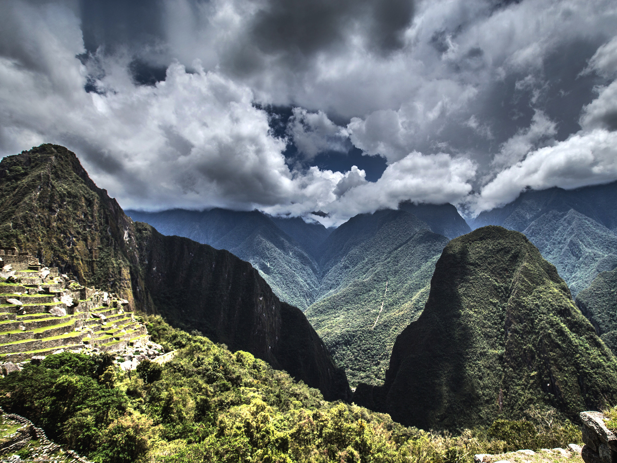 Canon EF 16-35mm F2.8L II USM sample photo. Cloud and mountain formations at machu pichu in peru photography