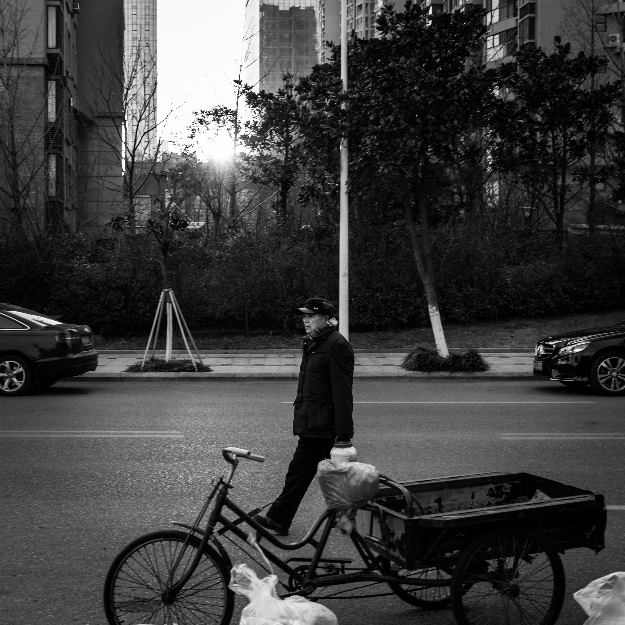 Canon EF-S 24mm F2.8 STM sample photo. Walking on the street photography