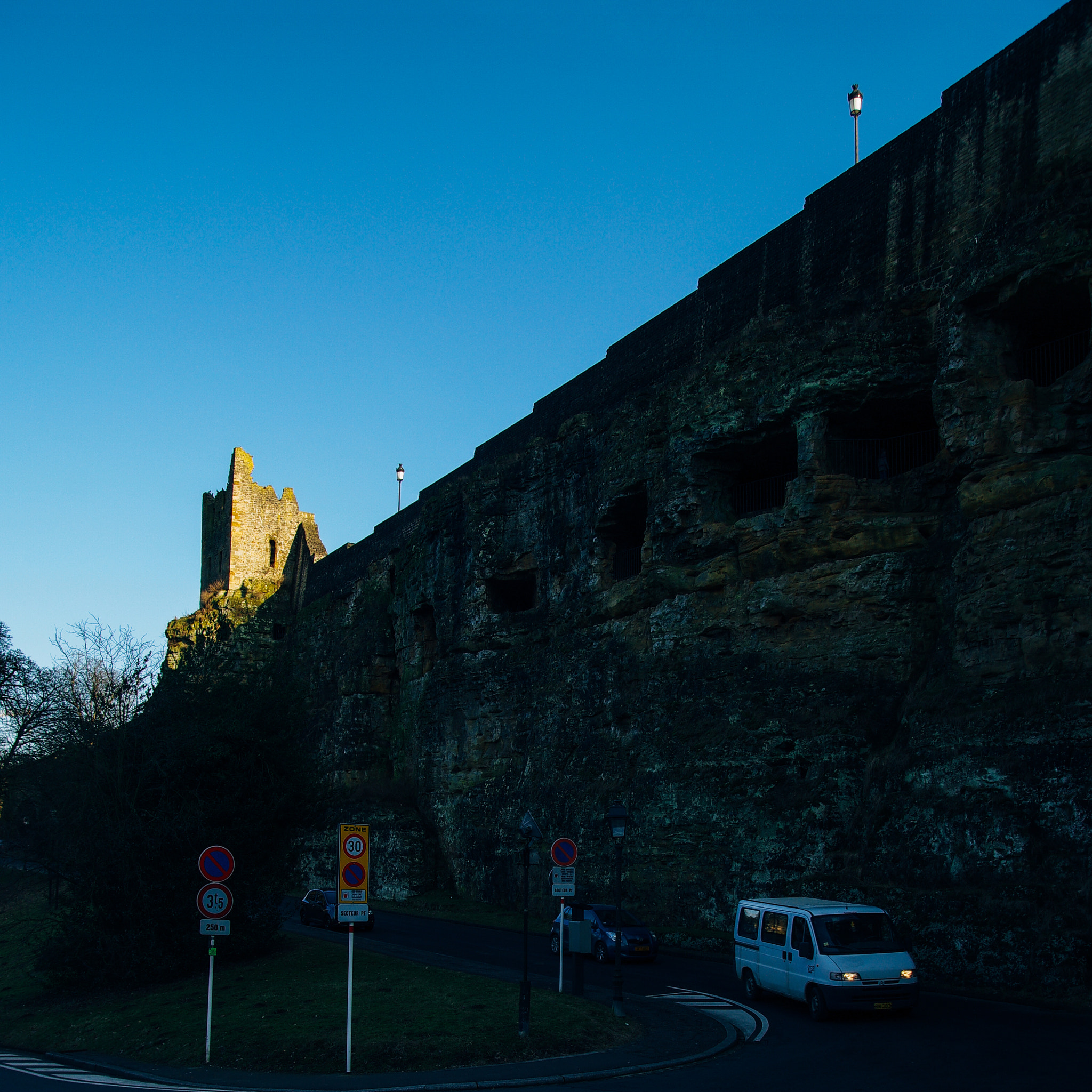 Pentax K20D sample photo. First sunlight at top of the ruin photography