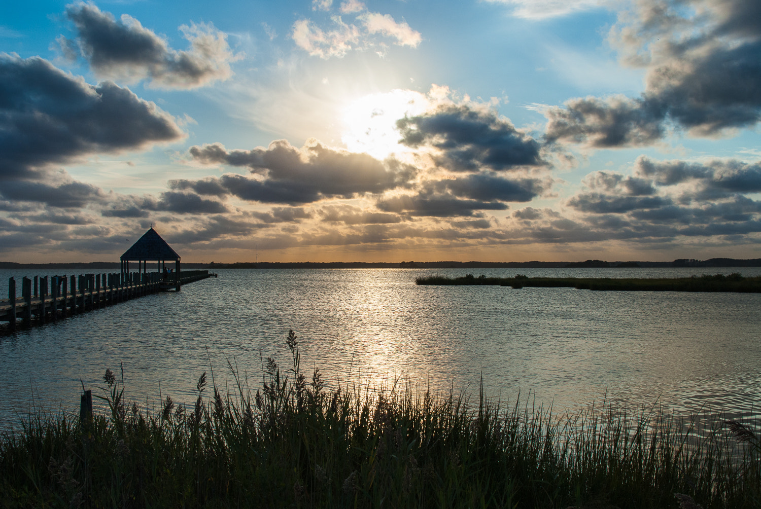 Nikon D200 sample photo. Sunset through clouds at the pier photography