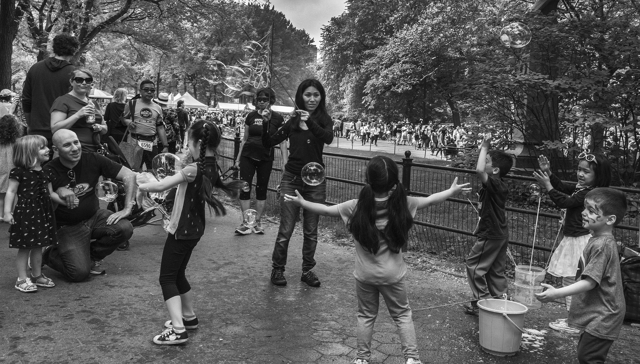 Nikon D7200 + Nikon AF-S Nikkor 20mm F1.8G ED sample photo. Bubbles at japan day in central park photography