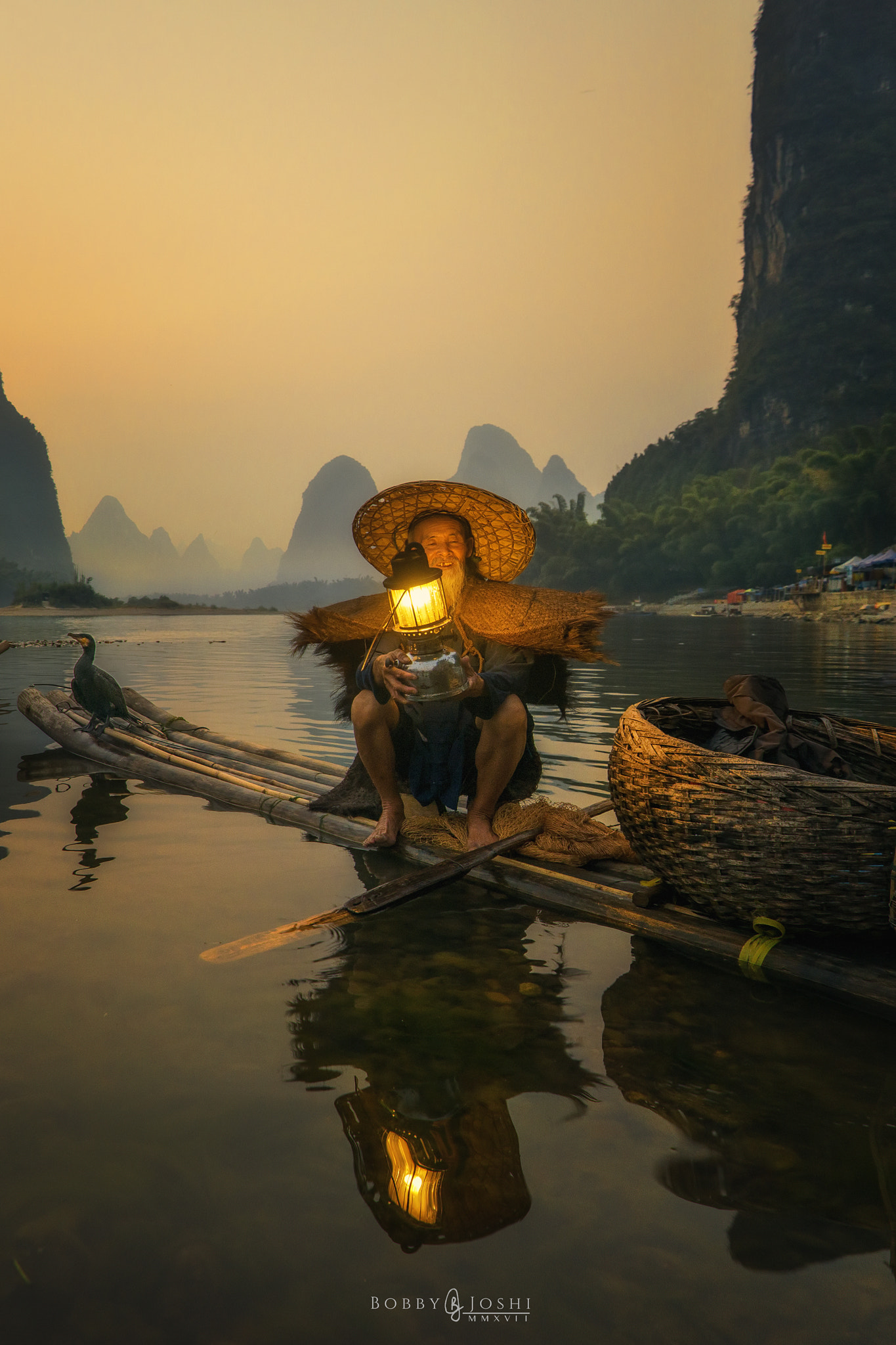Nikon AF-S Nikkor 16-35mm F4G ED VR sample photo. Story of a cormorant fisherman photography