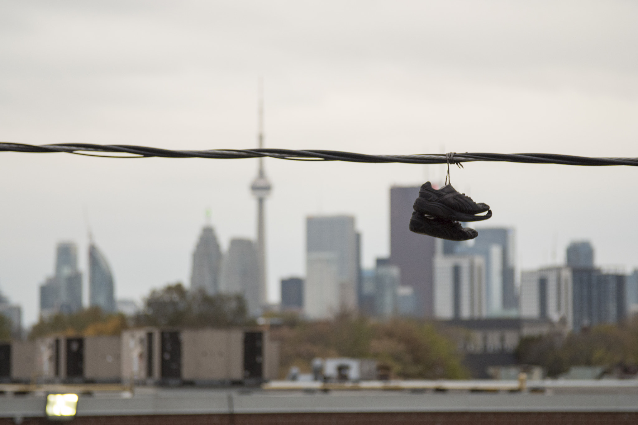 Canon EF 24-105mm F4L IS USM sample photo. Shoes and a skyline photography
