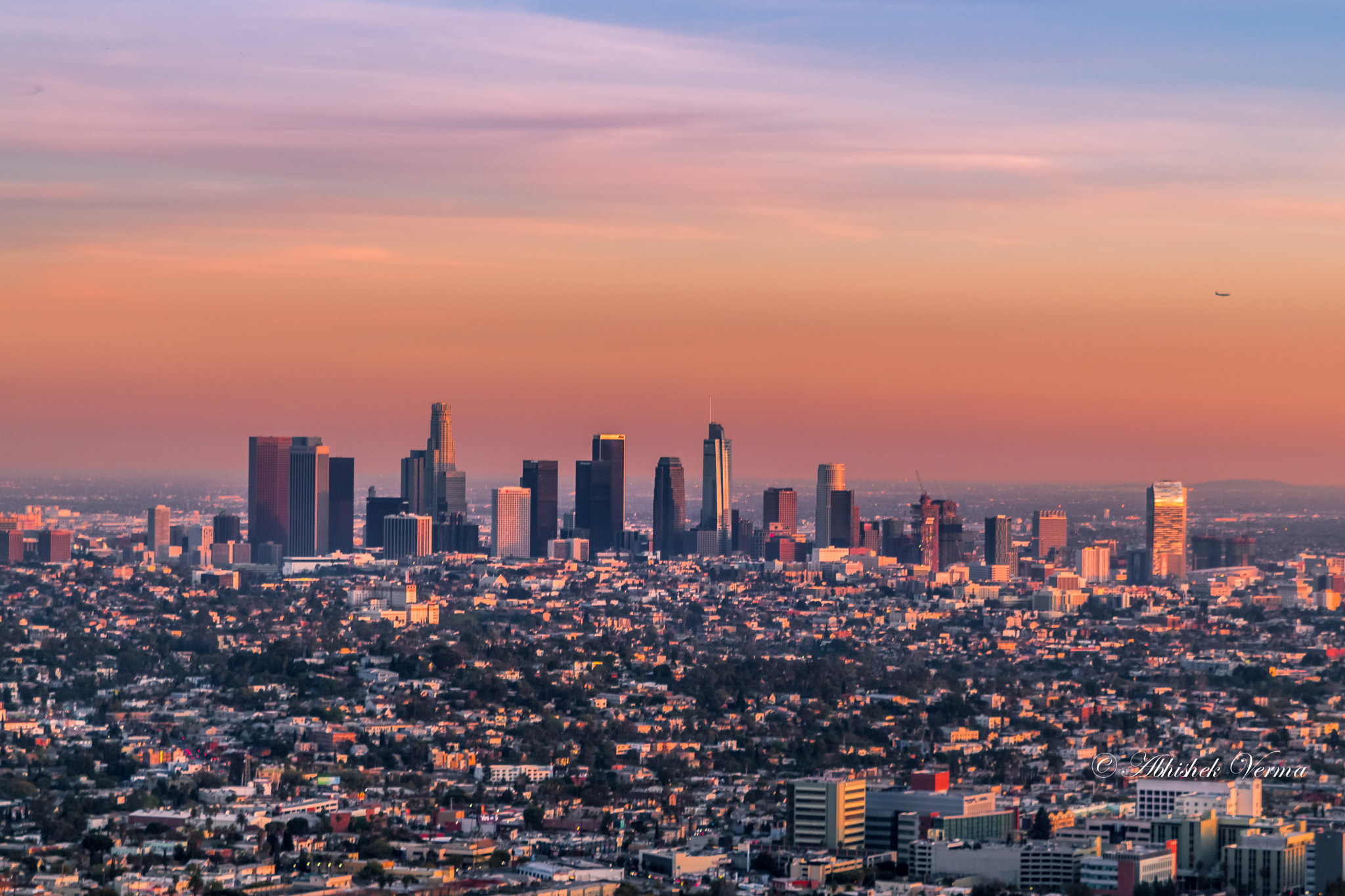 Canon EOS 550D (EOS Rebel T2i / EOS Kiss X4) + Sigma 24-70mm F2.8 EX DG Macro sample photo. La downtown at sunset photography