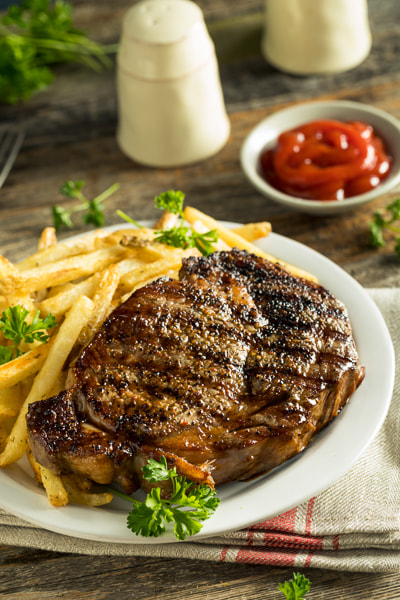 Canon EF 100mm F2.8L Macro IS USM sample photo. Hearty homemade steak and french fries photography