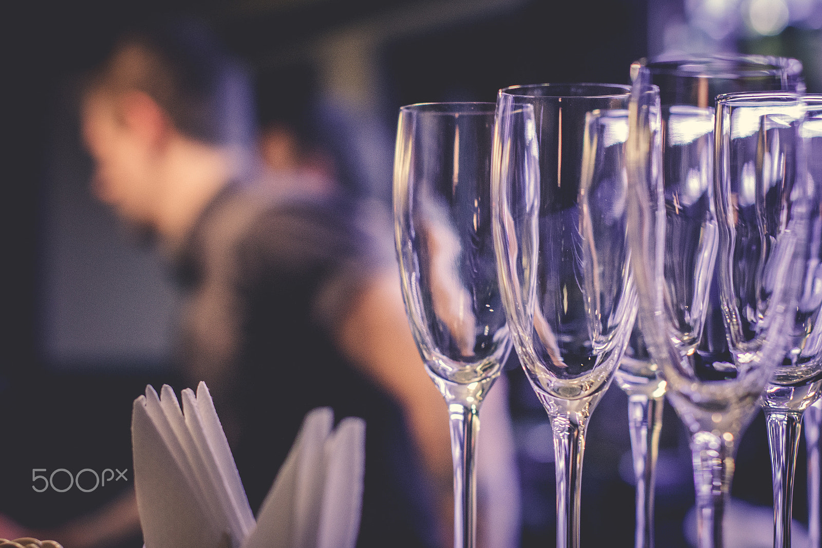 Sigma 50mm F1.4 EX DG HSM sample photo. Beautiful two glasses of champagne standing on the table in the background of a blurred room with... photography