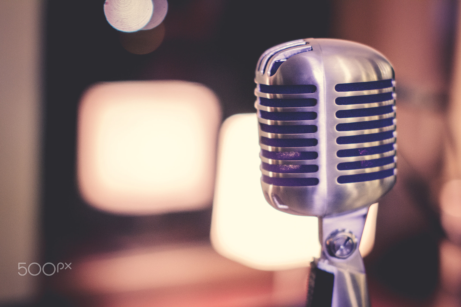Sigma 50mm F1.4 EX DG HSM sample photo. Retro style microphone on stage in the spotlight performance of the musical group. microphone for... photography