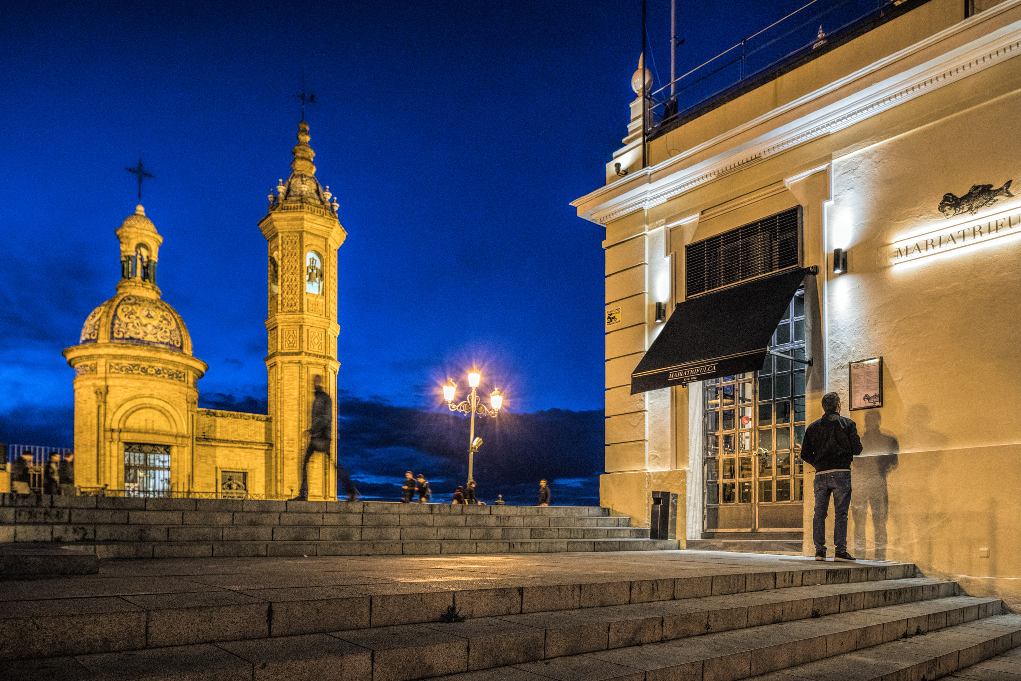 Canon TS-E 24.0mm f/3.5 L II sample photo. Capillita del carmen, triana bridge at dusk, seville, spain photography