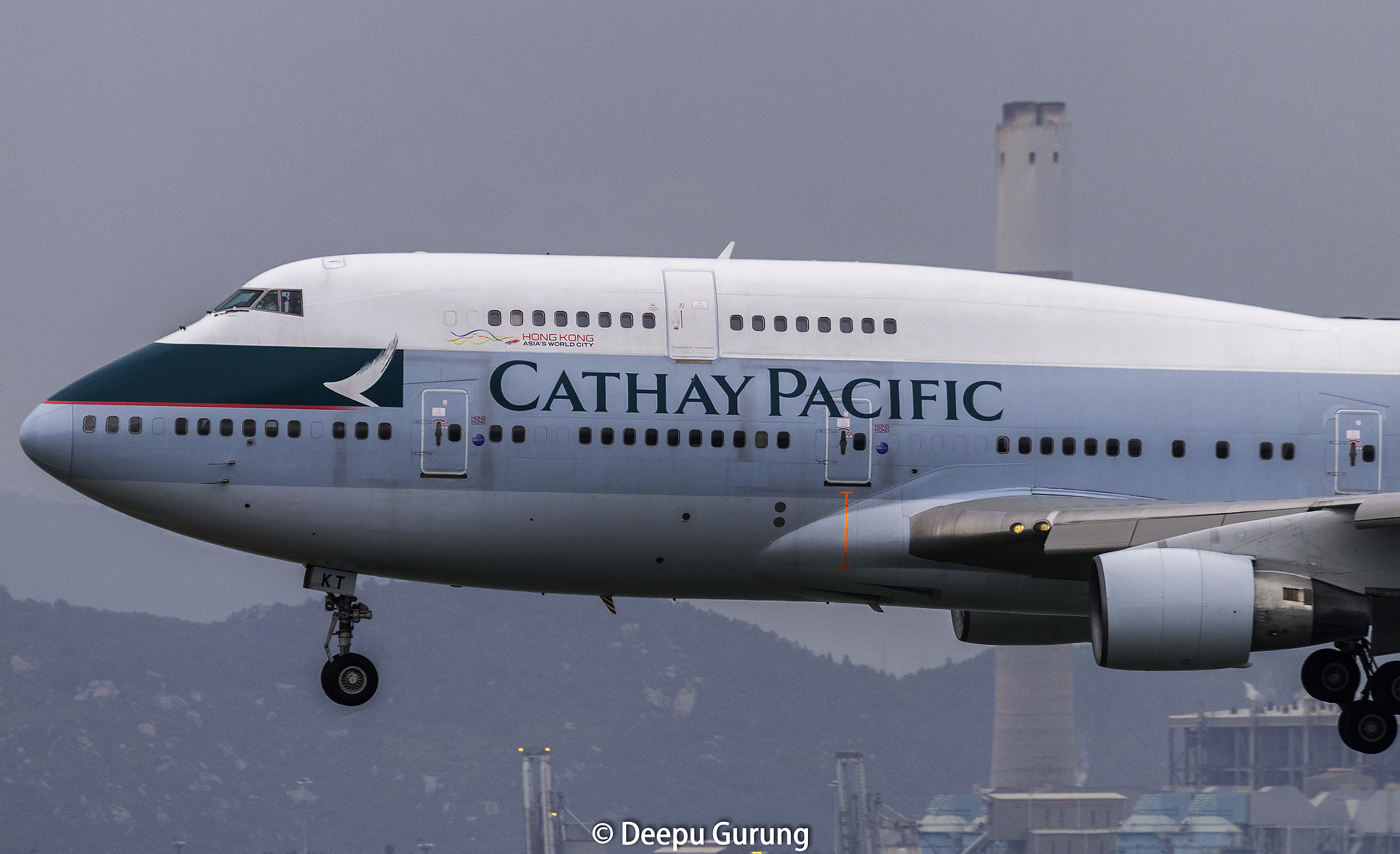 Canon EF 100-400mm F4.5-5.6L IS USM sample photo. Cathay pacific 747 photography