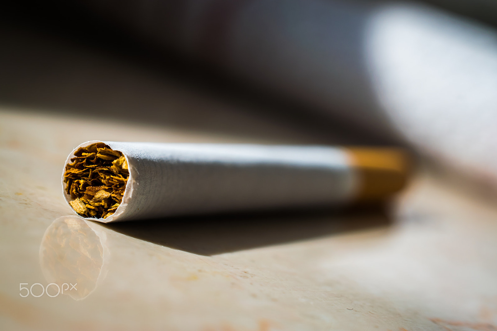 Nikon AF-S DX Micro Nikkor 40mm F2.8 sample photo. The cigarette photography