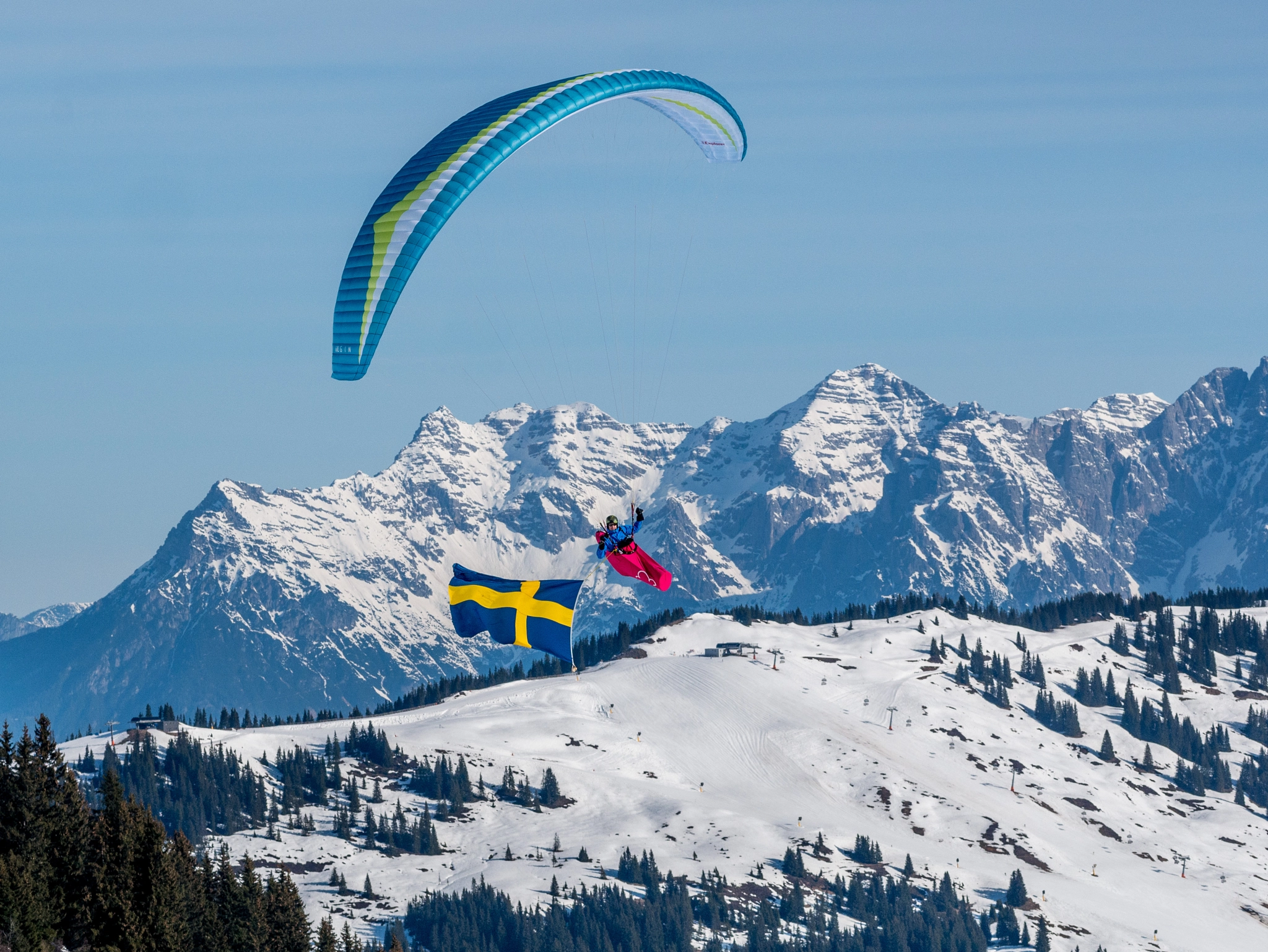 Panasonic Lumix DMC-GX7 + Olympus M.Zuiko Digital ED 75mm F1.8 sample photo. Swedish flag over the alps photography