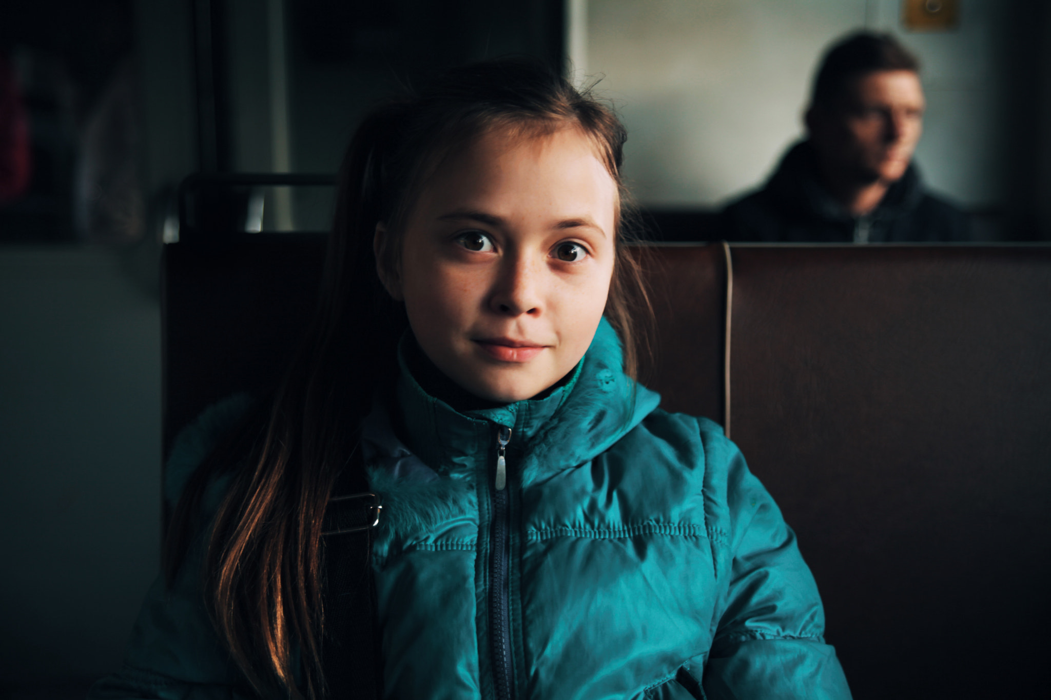Canon EOS 5D Mark II sample photo. This is young girl in train, when i take a photo she was very happy. photography