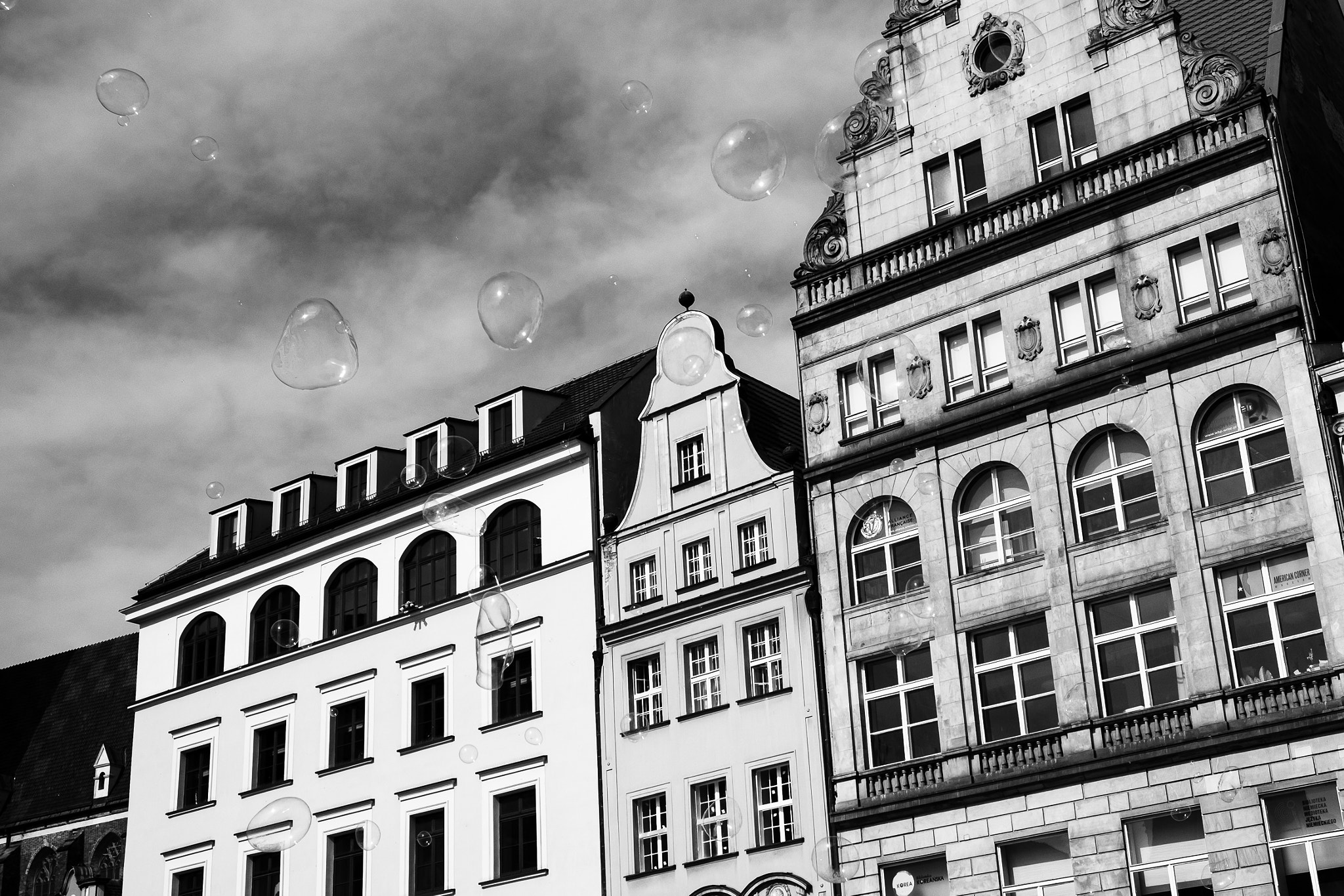 Fujifilm X-Pro1 sample photo. Old town buildings with soap bubbles photography