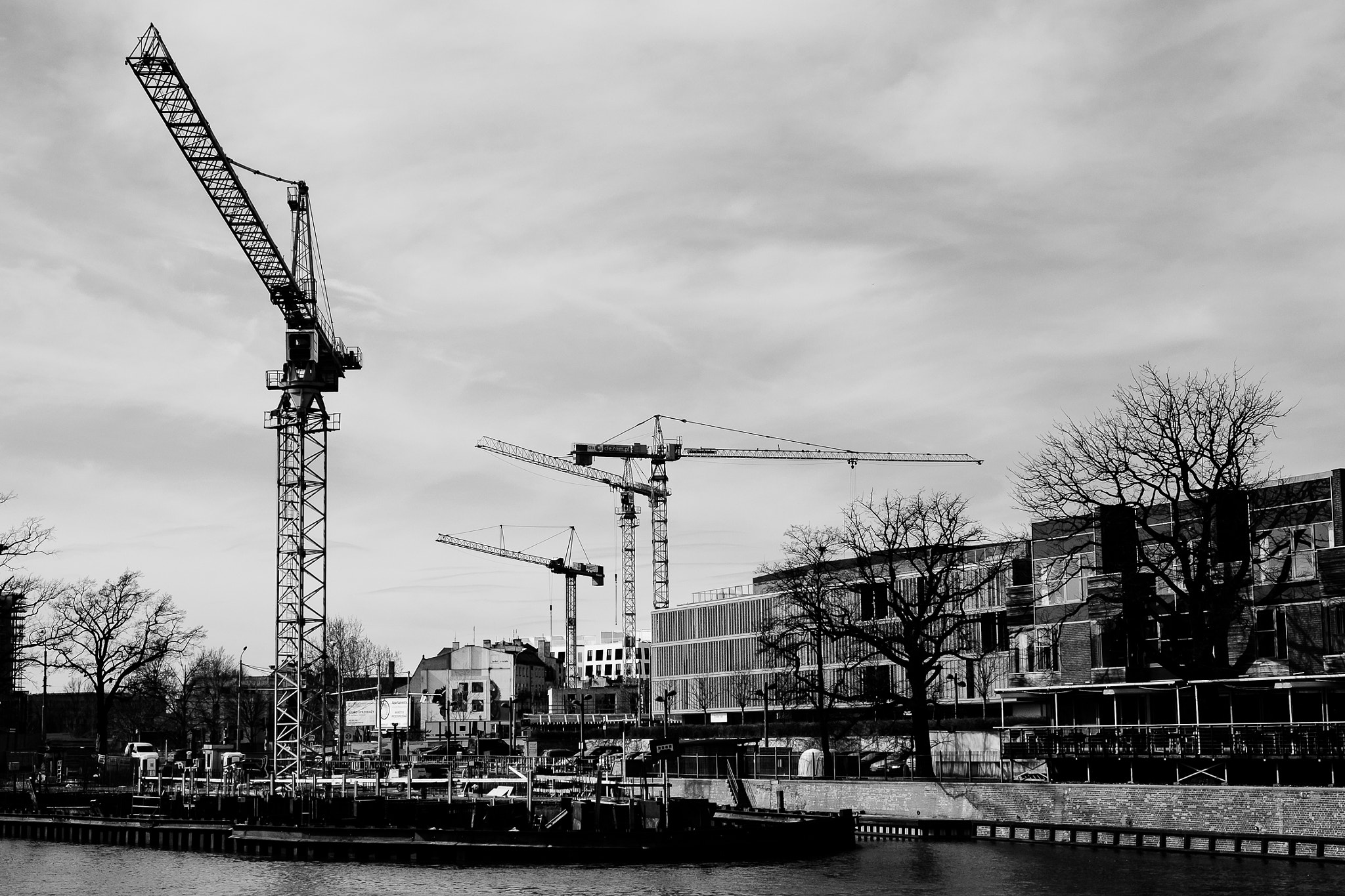 Fujifilm X-Pro1 sample photo. Construction site with cranes photography