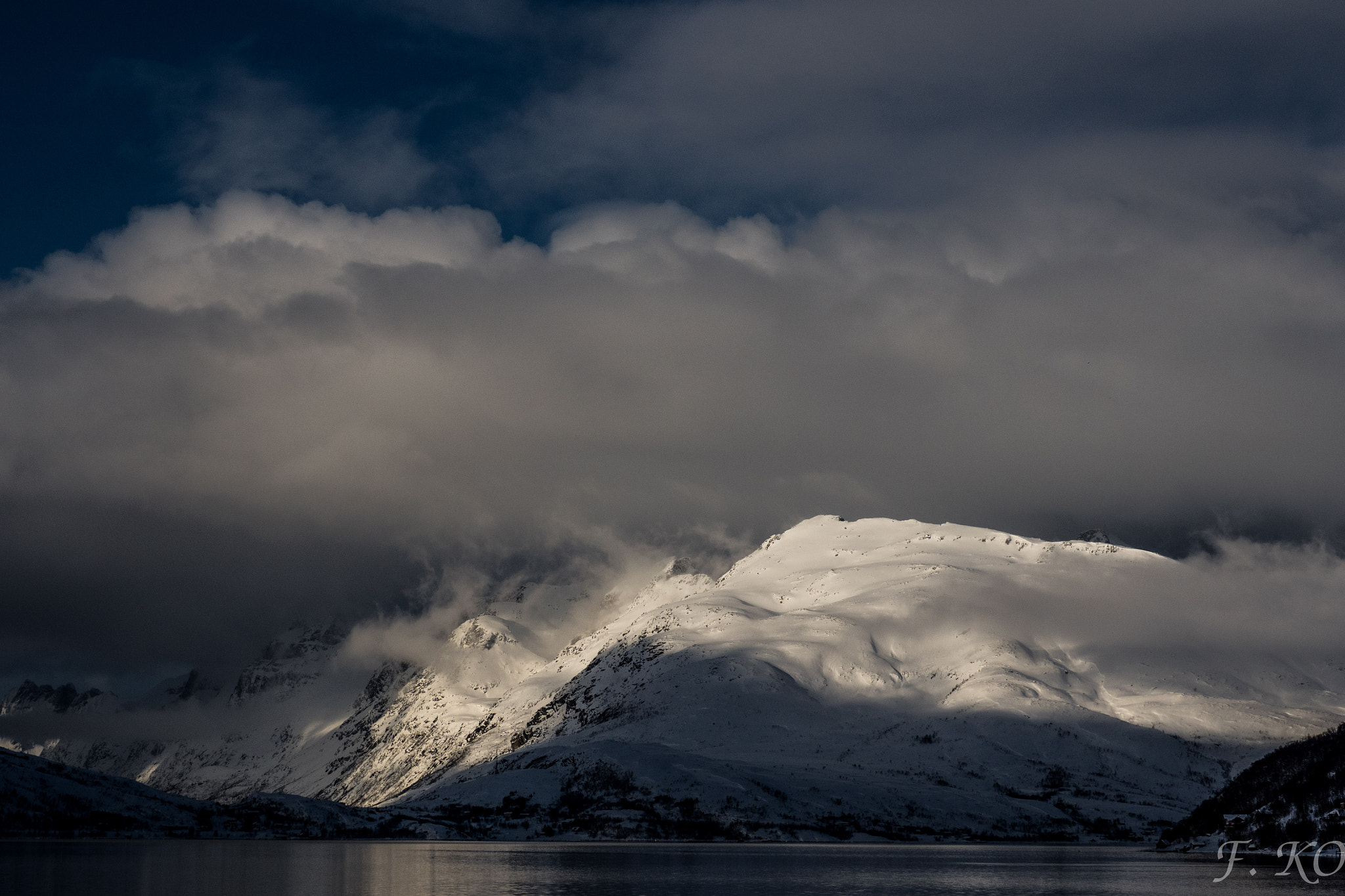 Olympus OM-D E-M5 II sample photo. Cloud slides over mountains photography