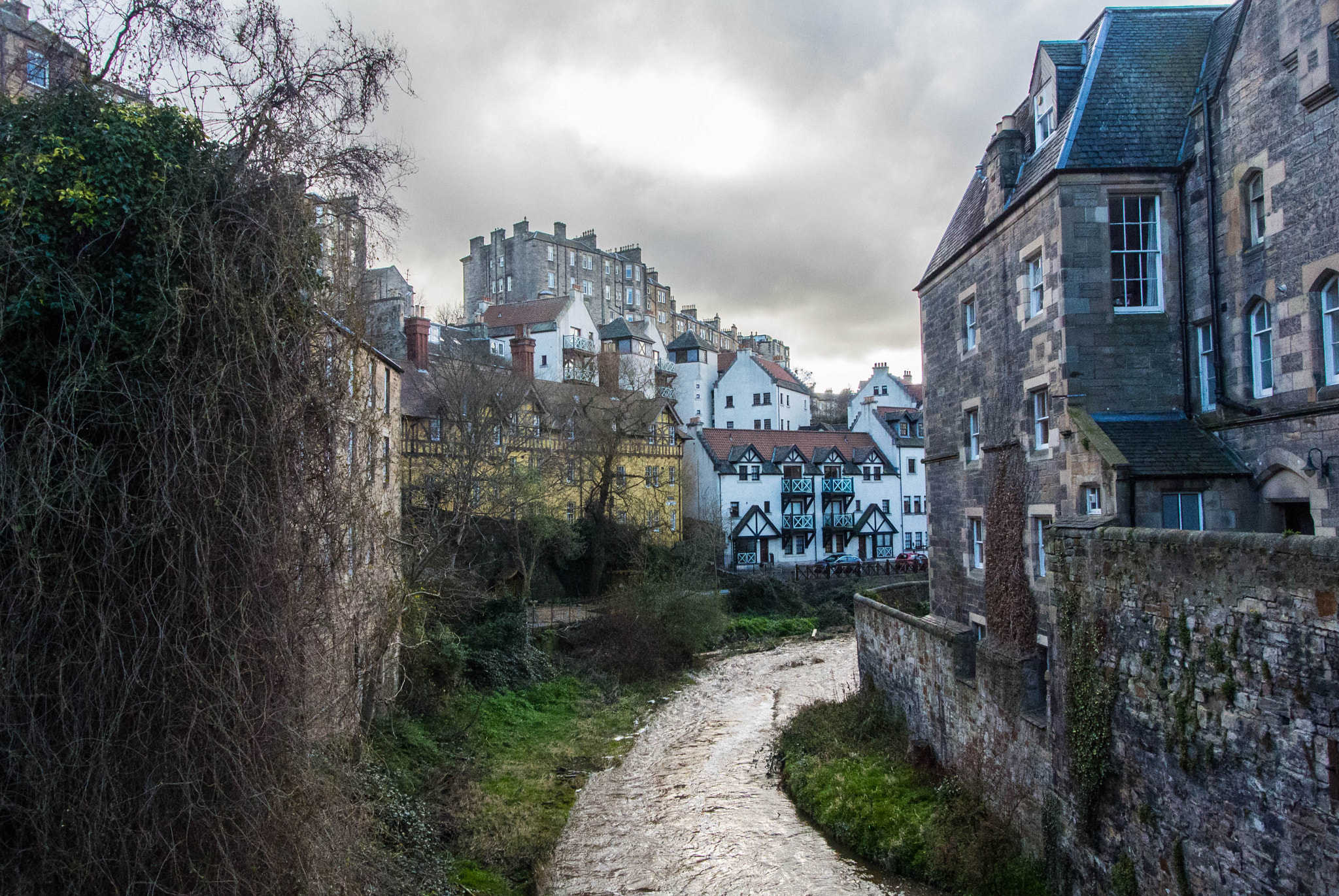Nikon 1 Nikkor VR 10-30mm F3.5-5.6 sample photo. Dark clouds over the dean village photography
