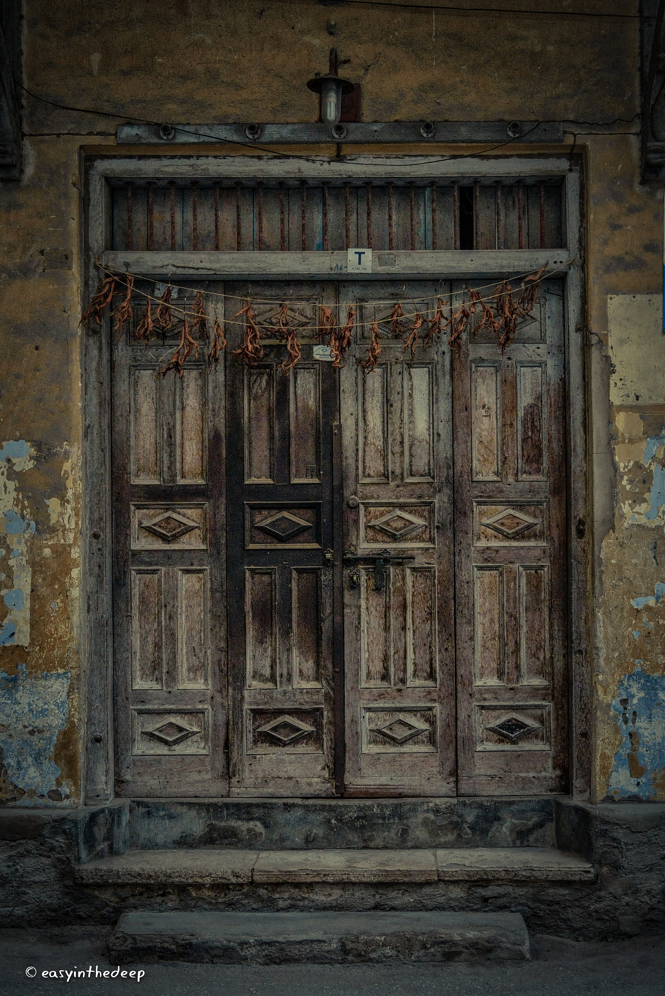 Nikon AF-S Nikkor 24-70mm F2.8E ED VR sample photo. Stone town door. photography
