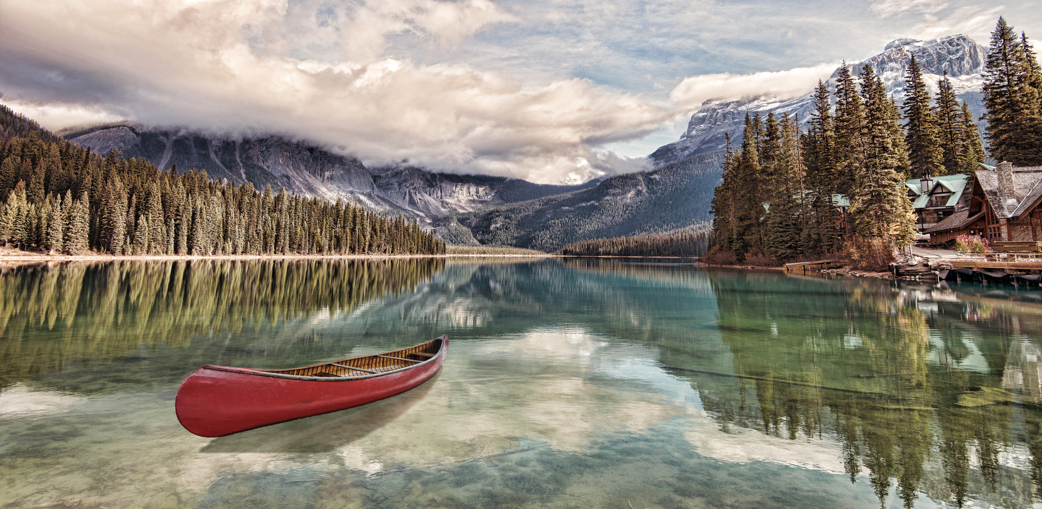 Nikon D800E + Nikon AF-S Nikkor 16-35mm F4G ED VR sample photo. Red canoe on emerald lake photography