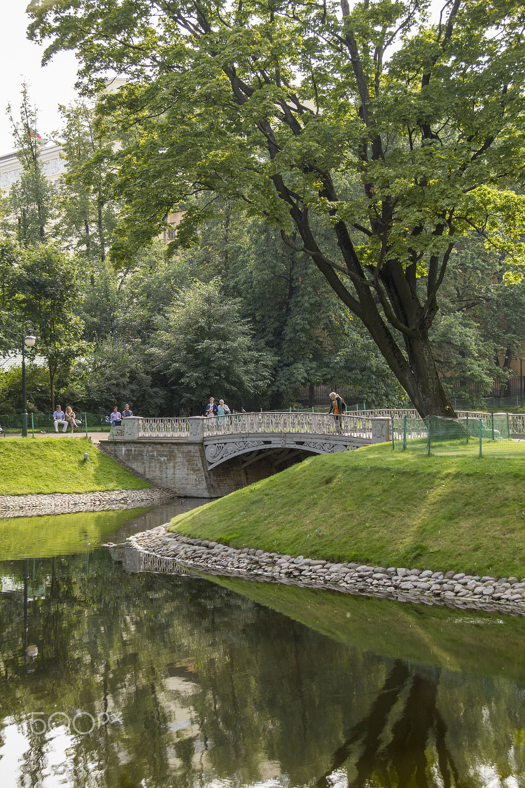 Canon EF-S 18-200mm F3.5-5.6 IS sample photo. Cast iron bridge in mikhailovsky garden, idillic park in central photography