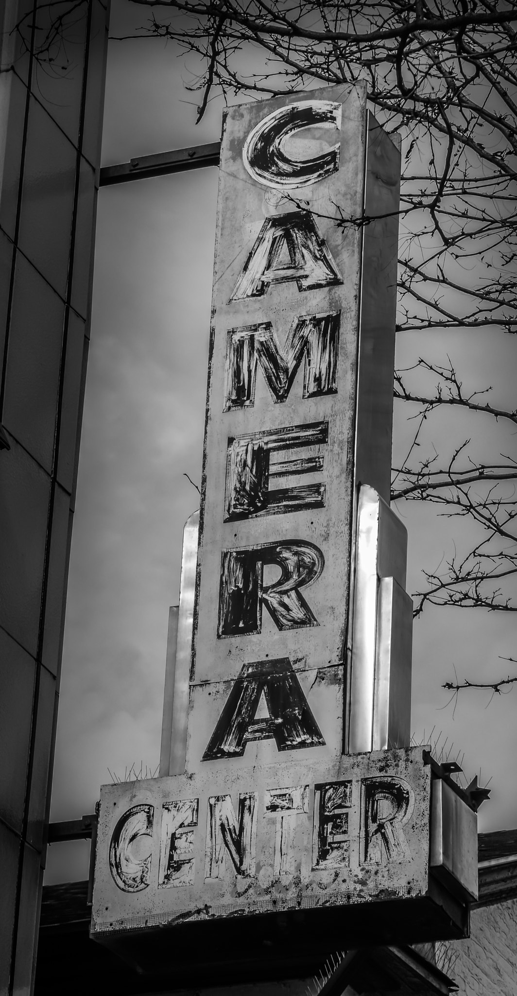 Sigma 28-105mm F2.8-4 Aspherical sample photo. Old store sign photography