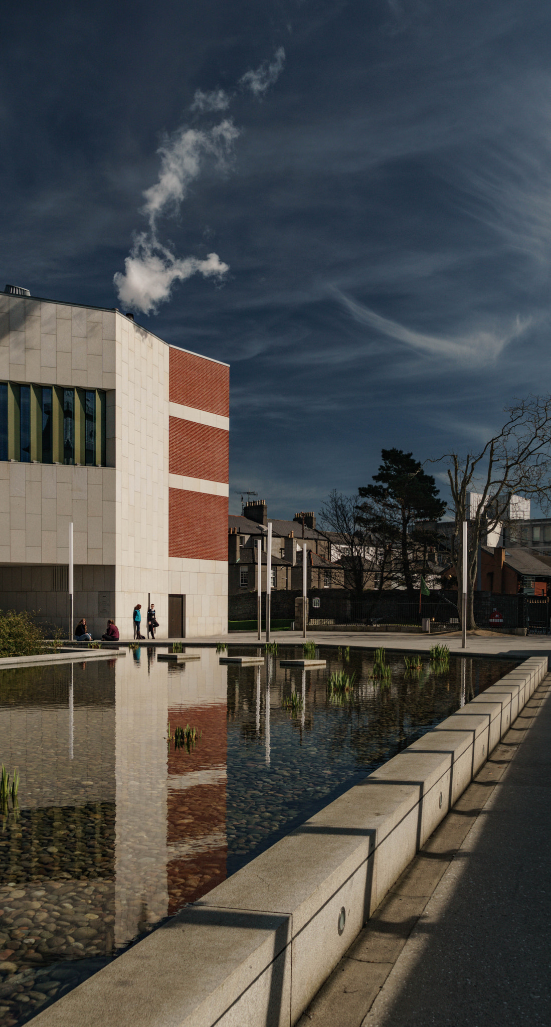 Sony a6000 + Sony FE 24-240mm F3.5-6.3 OSS sample photo. Smoke break at the library in dun laoghaire. #dlrlexicon photography