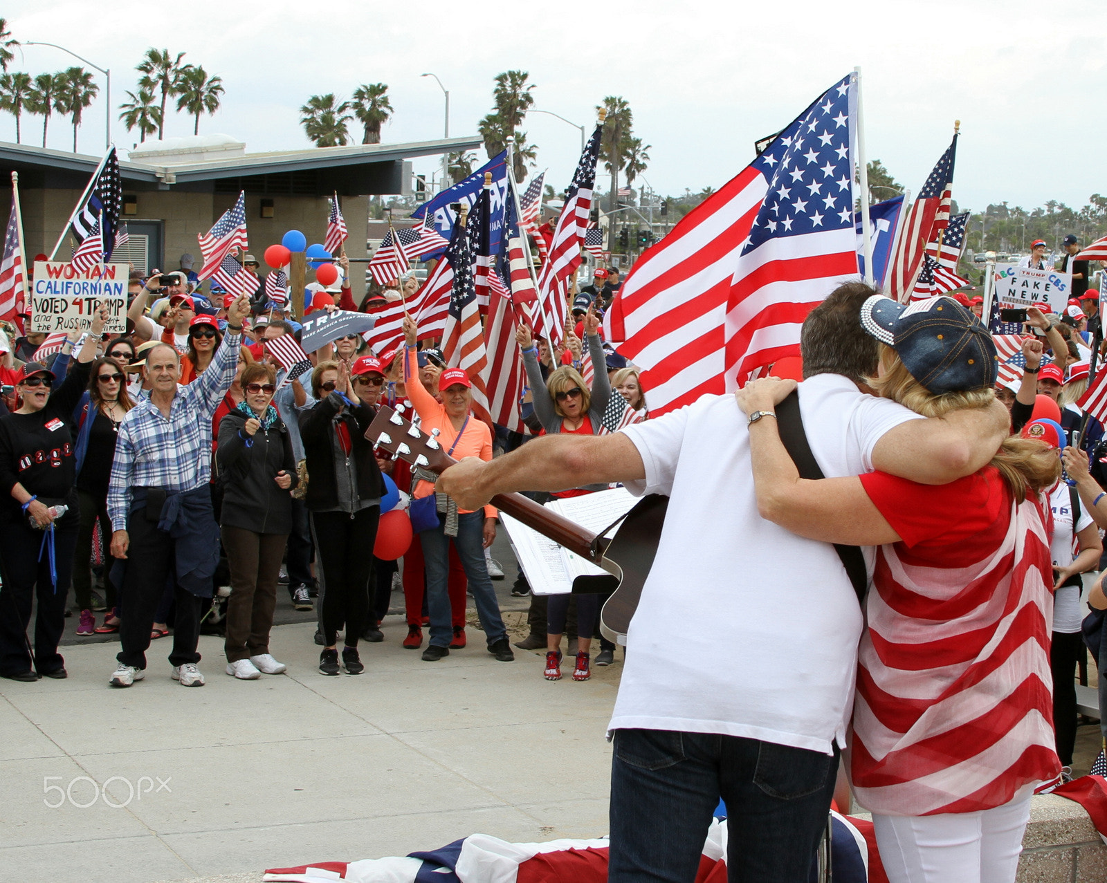 Canon EF 28-135mm F3.5-5.6 IS USM sample photo. Trump rally bolsa chica beach photography