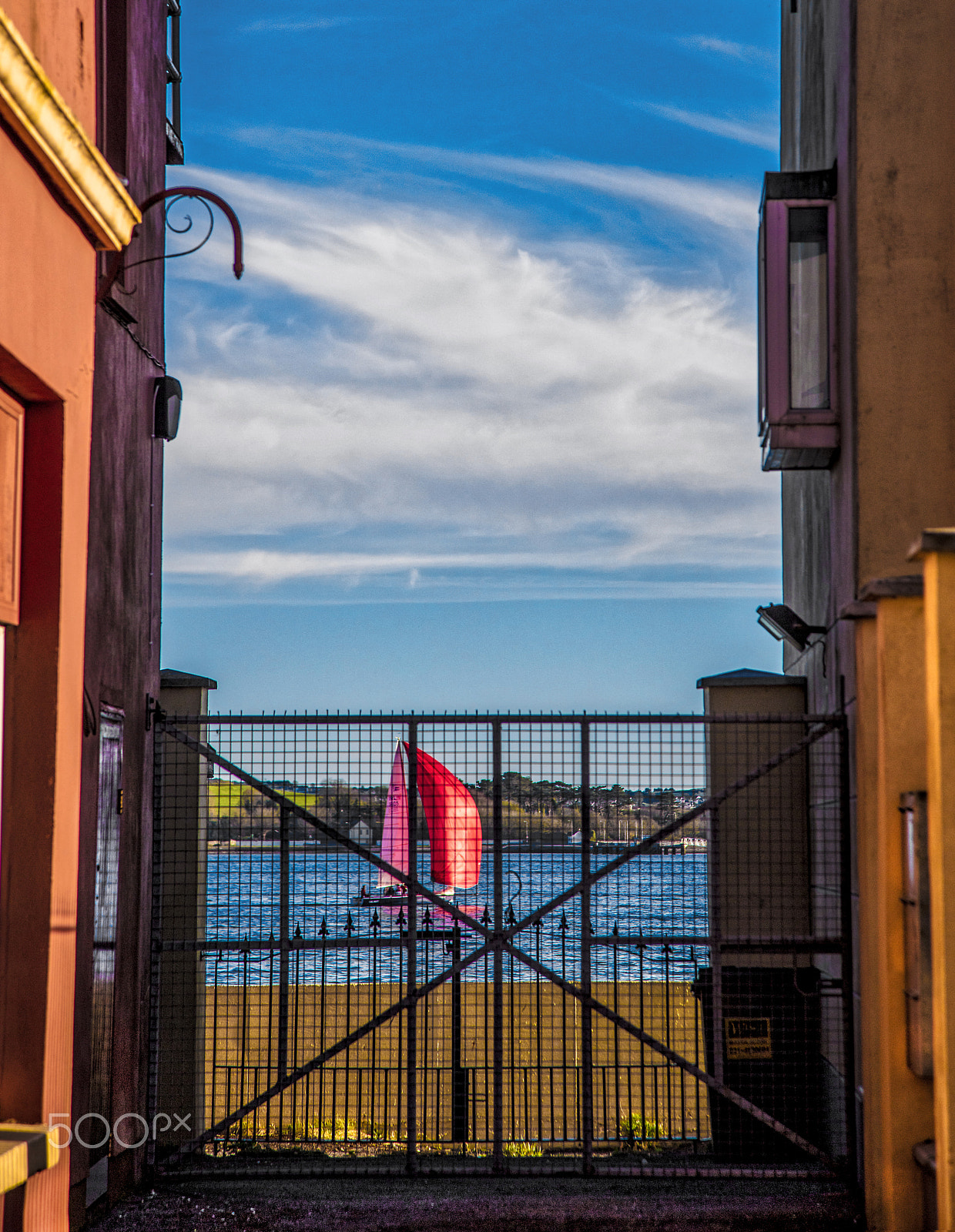 Canon EOS 5DS R + Canon EF 24-105mm F4L IS USM sample photo. Sail boat through alleyway photography