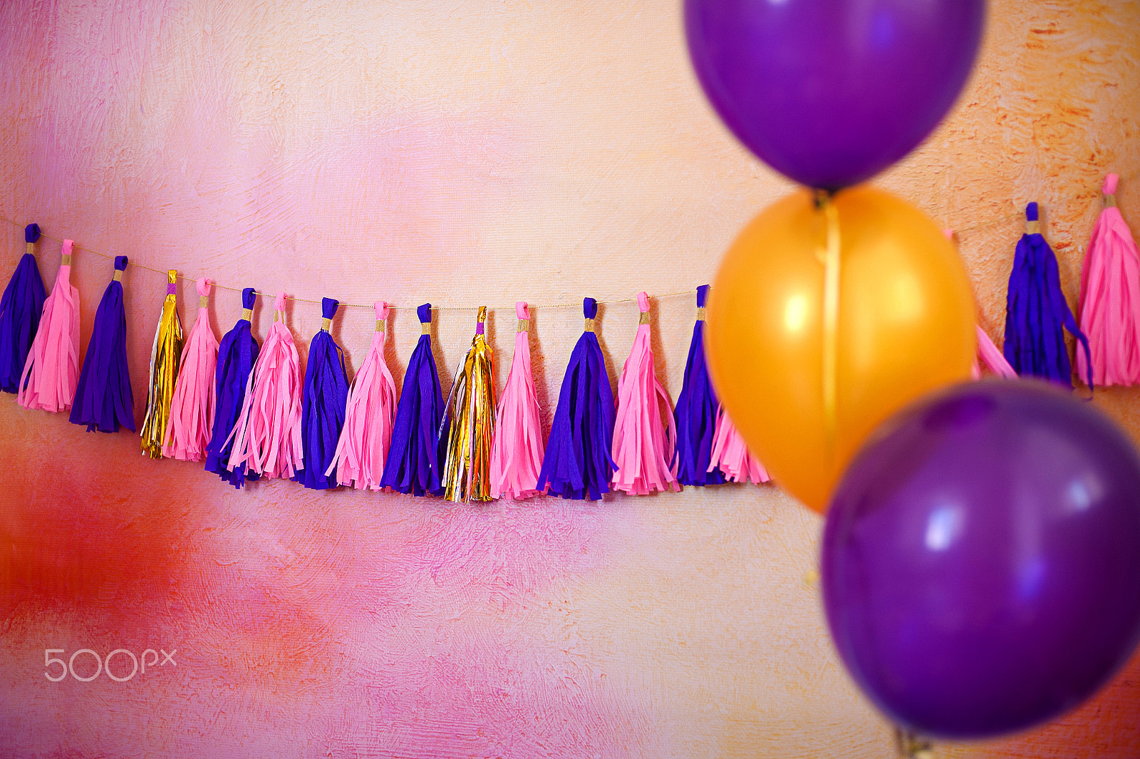 Nikon D700 + Nikon AF Nikkor 50mm F1.4D sample photo. Garland on a painted background with multi-colored balloons photography