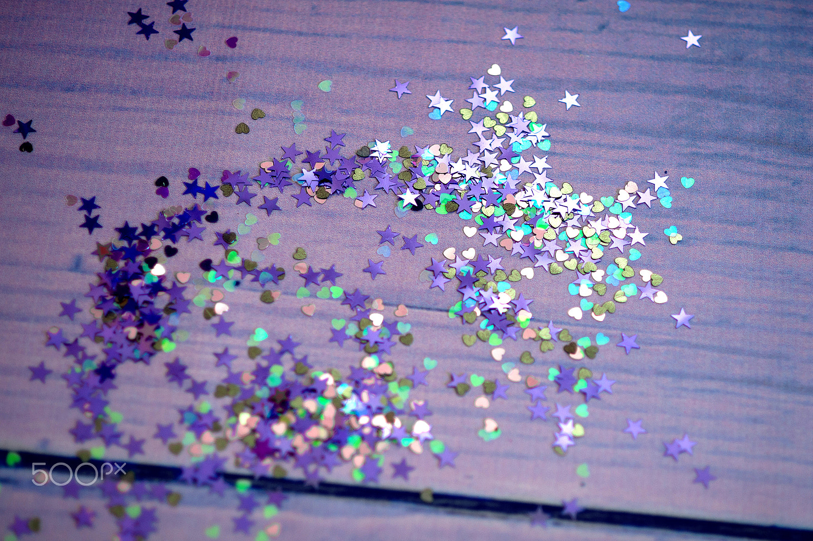 Nikon D700 + Nikon AF Nikkor 85mm F1.8D sample photo. Colorful confetti in the shape of a heart in front of purple background photography