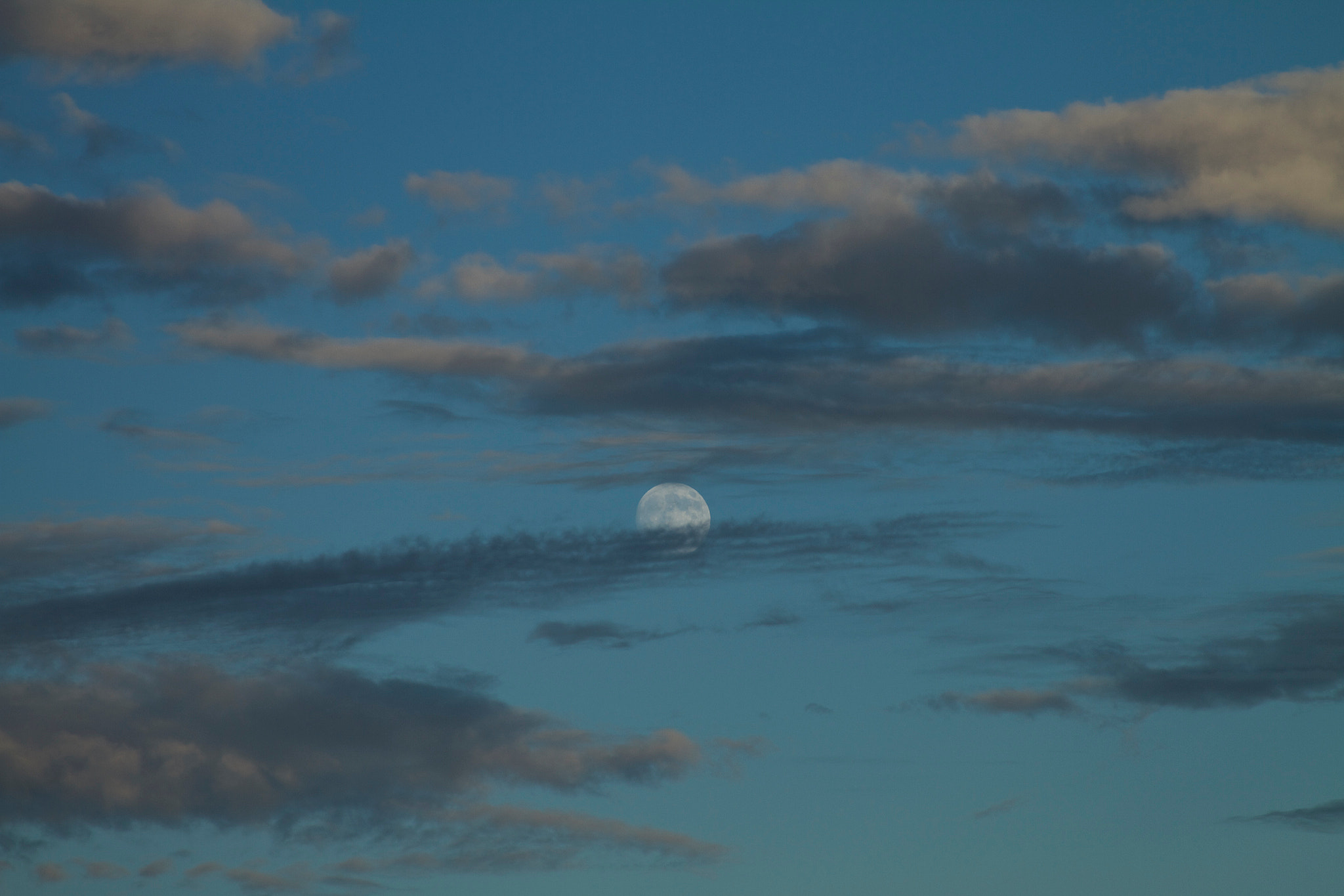 Canon EOS 7D + Canon EF 28-135mm F3.5-5.6 IS USM sample photo. Cloudy moon photography