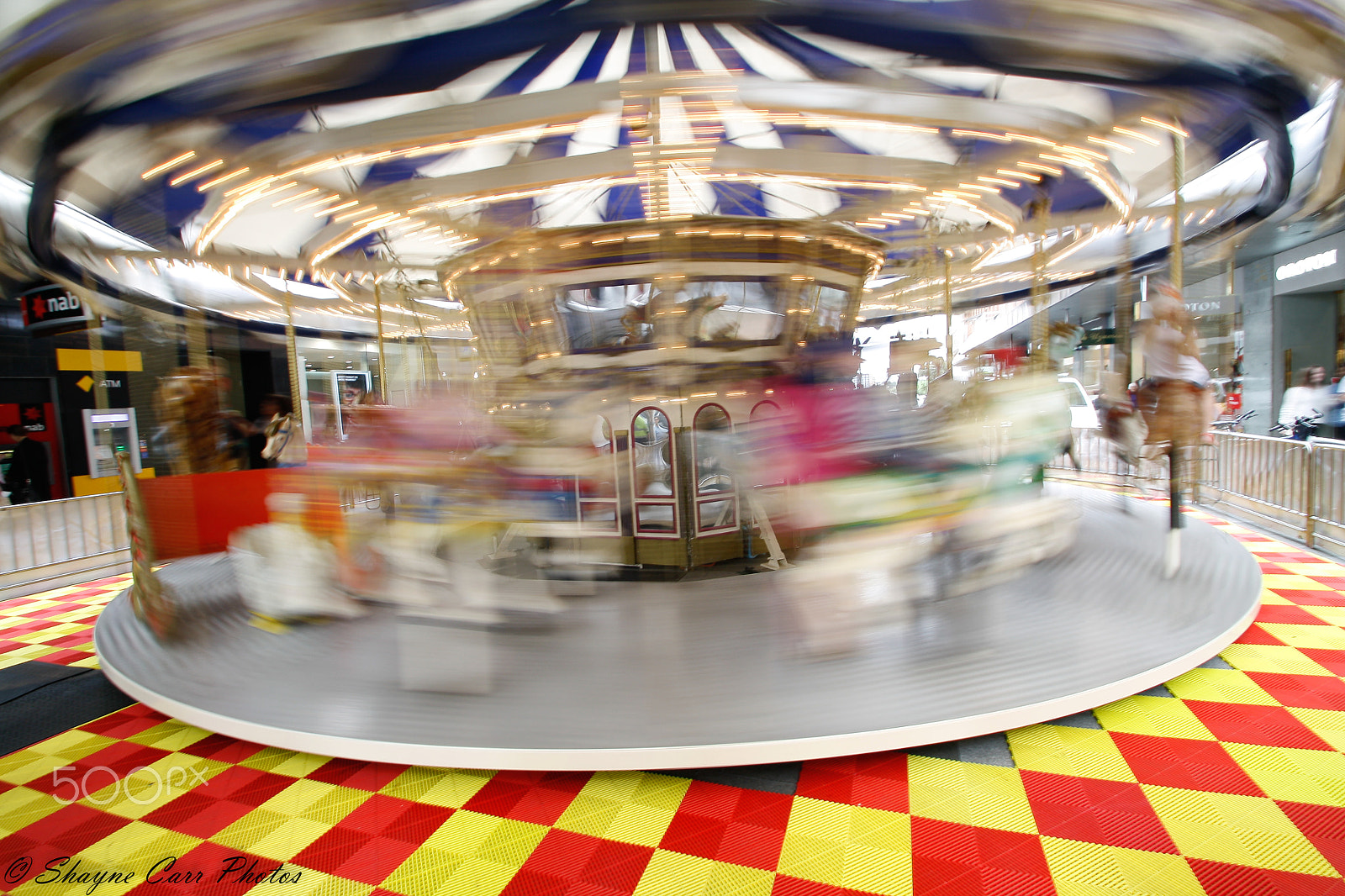 Sigma 10-20mm F3.5 EX DC HSM sample photo. Spinning  carousel photography