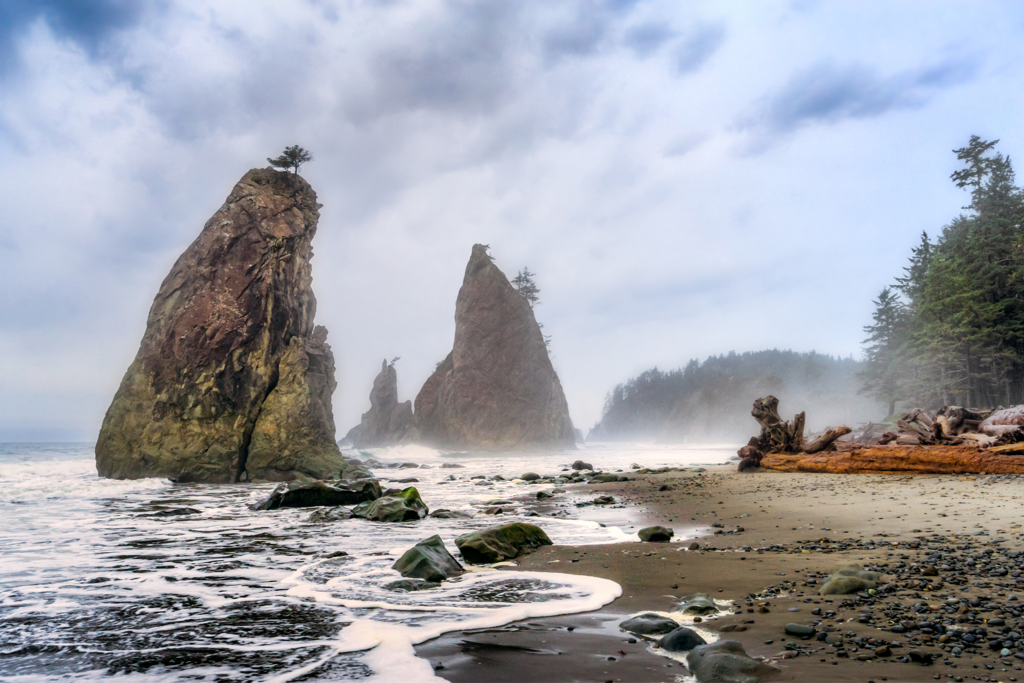 Sony a6000 + Sony E 10-18mm F4 OSS sample photo. Sea stacks in the mist photography