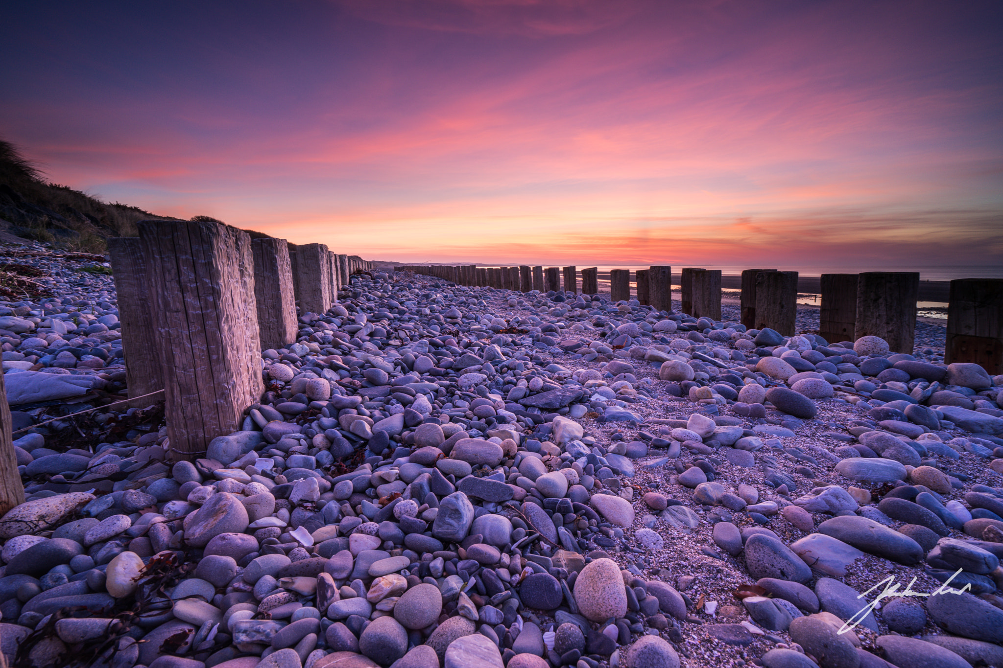 Sony a7 + Sony Vario-Tessar T* FE 16-35mm F4 ZA OSS sample photo. Groynes on murlough beach. newcastle northern ireland. photography